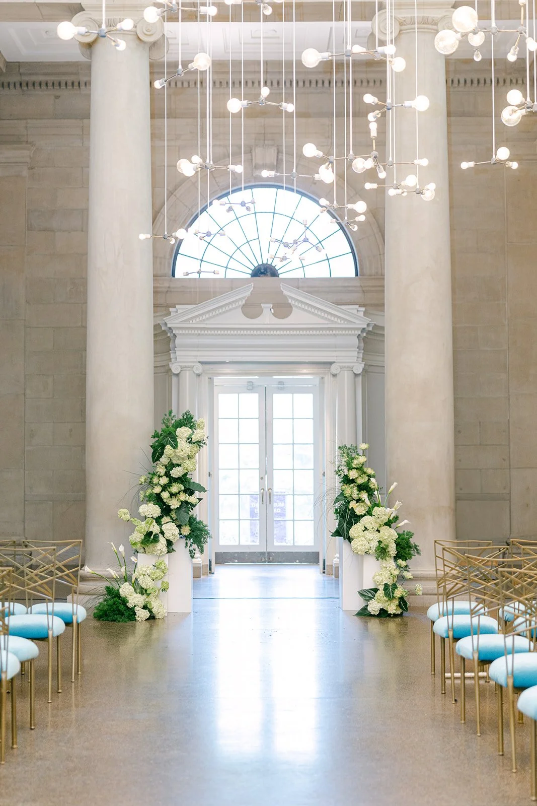 Phylicia Willis Photography
bride and groom modern florals green and white candles estate table Baltimore Museum of Art 
Ceremony pedestals modern