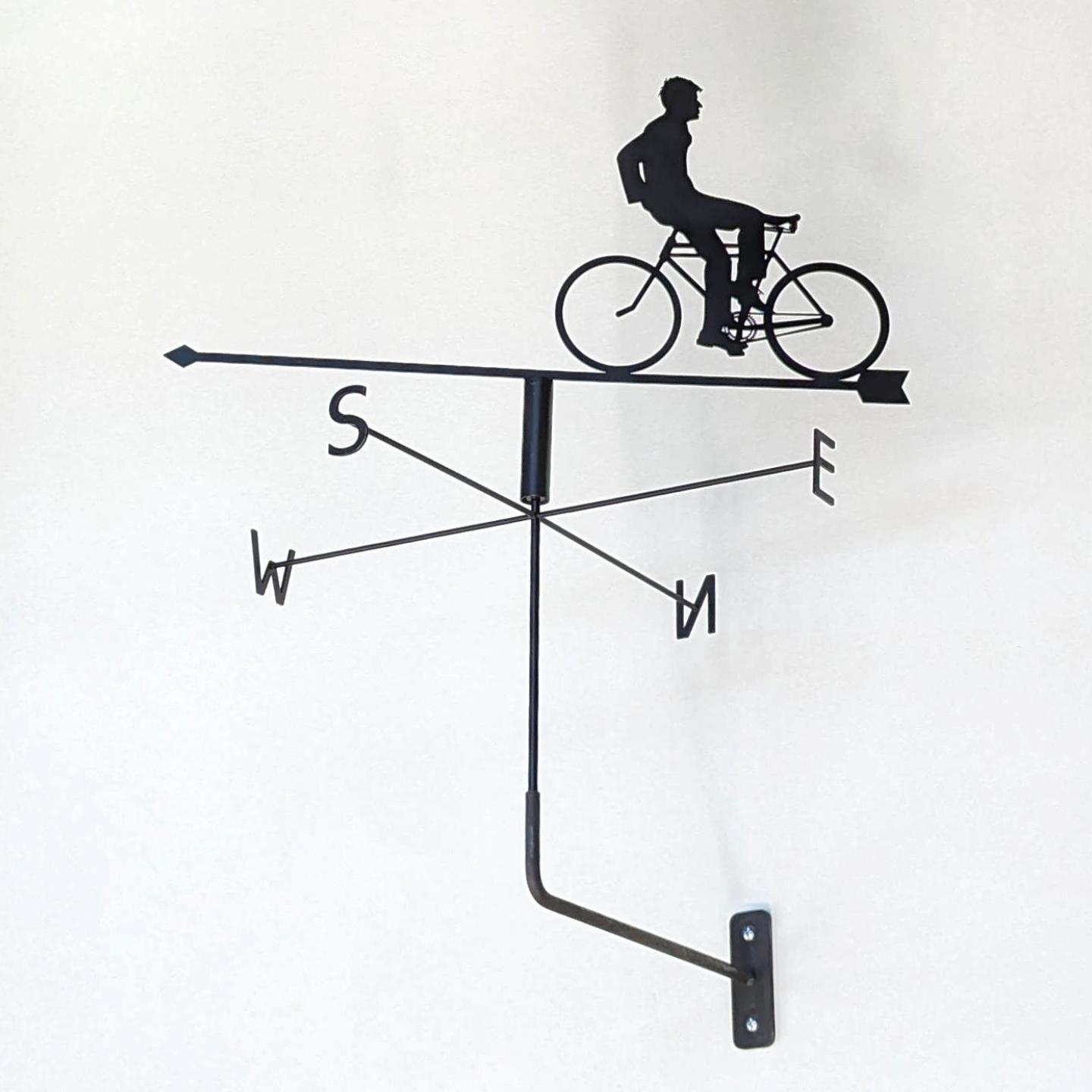 Beloved Vancouver artist Rodney Graham (1949-2022) challenged our perception of time and perspective with his Weather Vanes. Here at ADDITION, we're honoured to offer a playful interpretation, depicting Graham riding a bicycle, defying convention in 