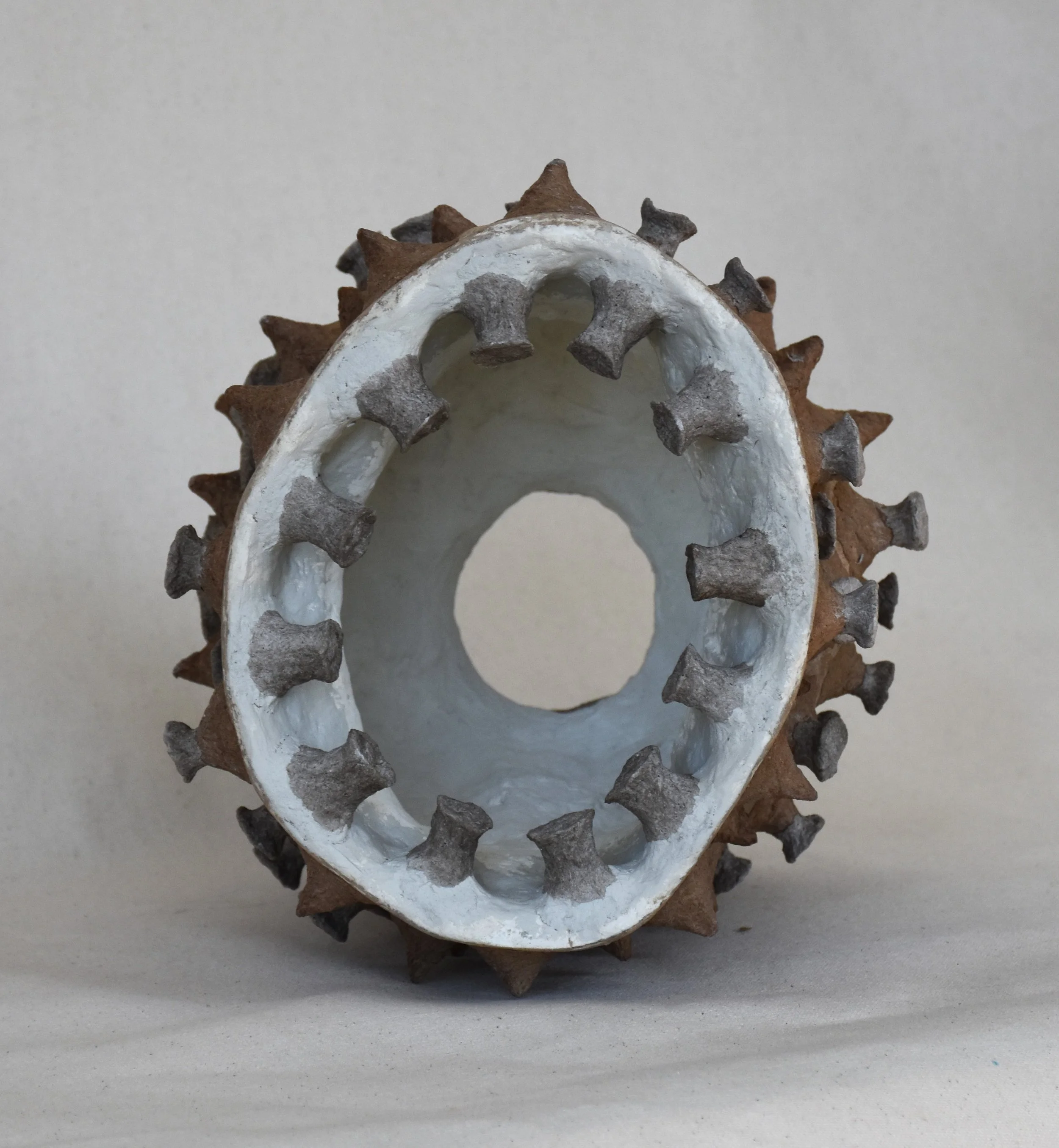 Maya River, Celestial Echoes-O, 2023/24, Recycled paper and gypsum compound, 9.5 x 9.5 x 10 in