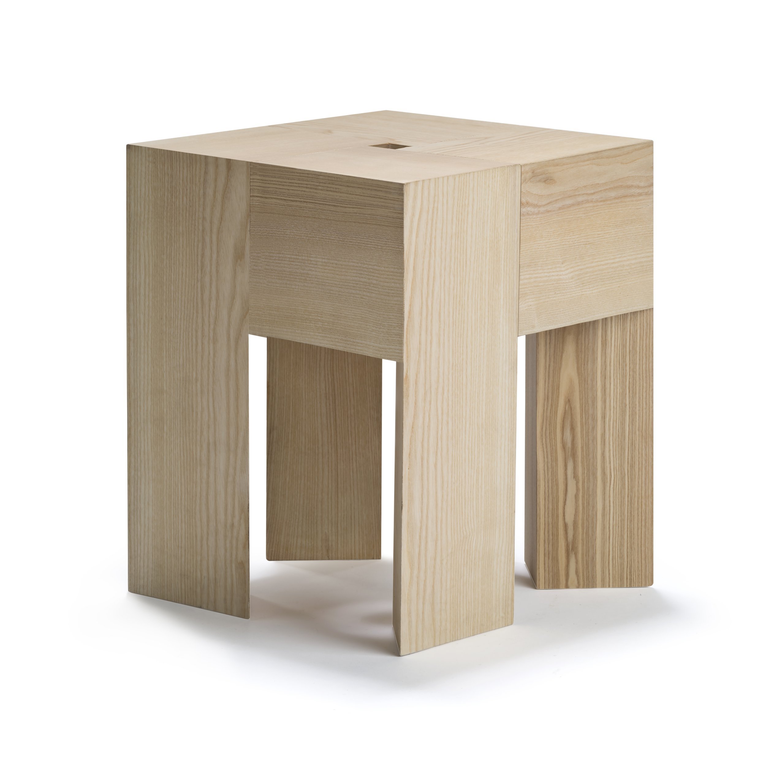 A minimalist wooden side table with a square top and wide, flat legs.