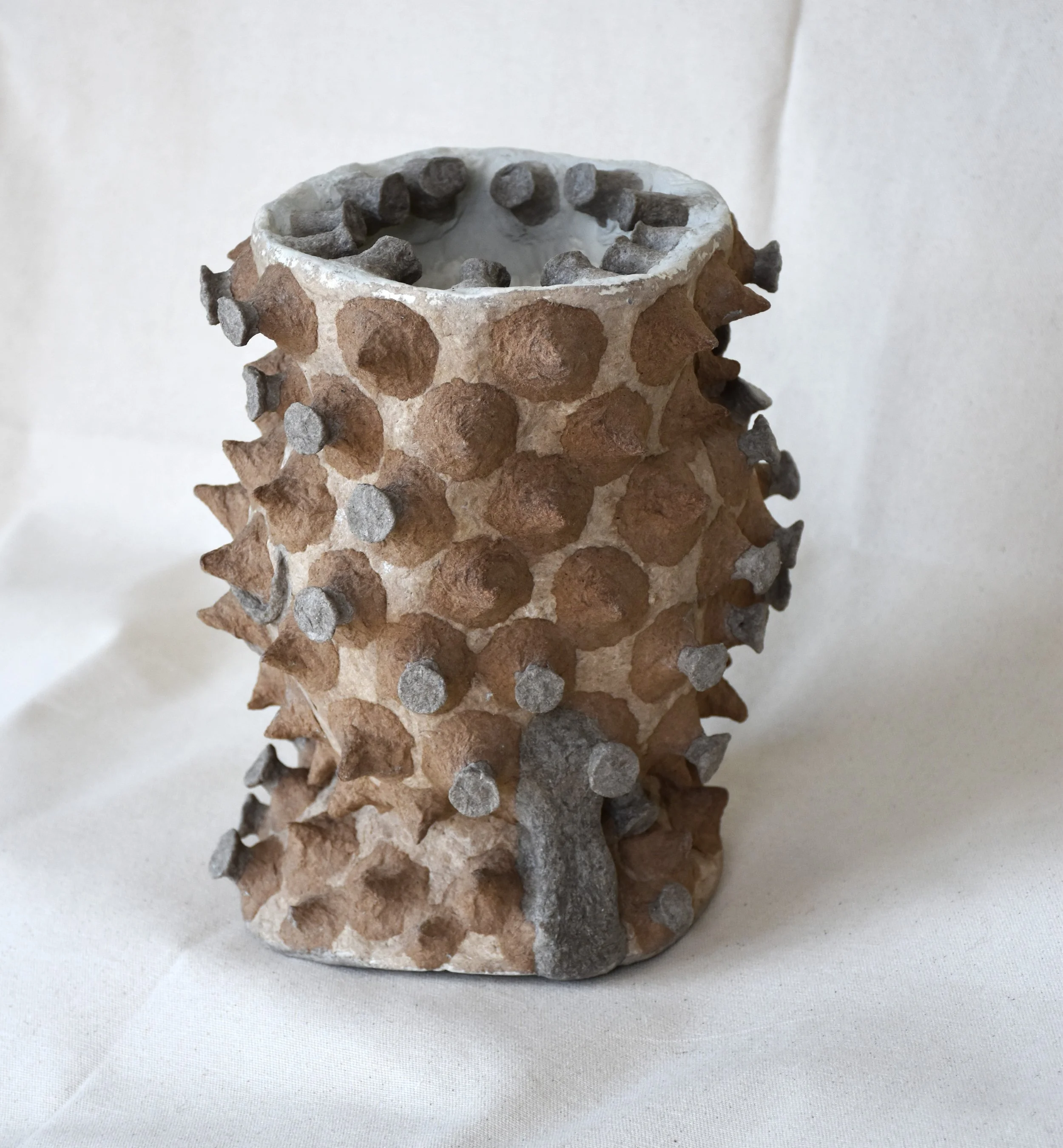 Maya River, Celestial Echoes-O, 2023/24, Recycled paper and gypsum compound, 9.5 x 9.5 x 10 in