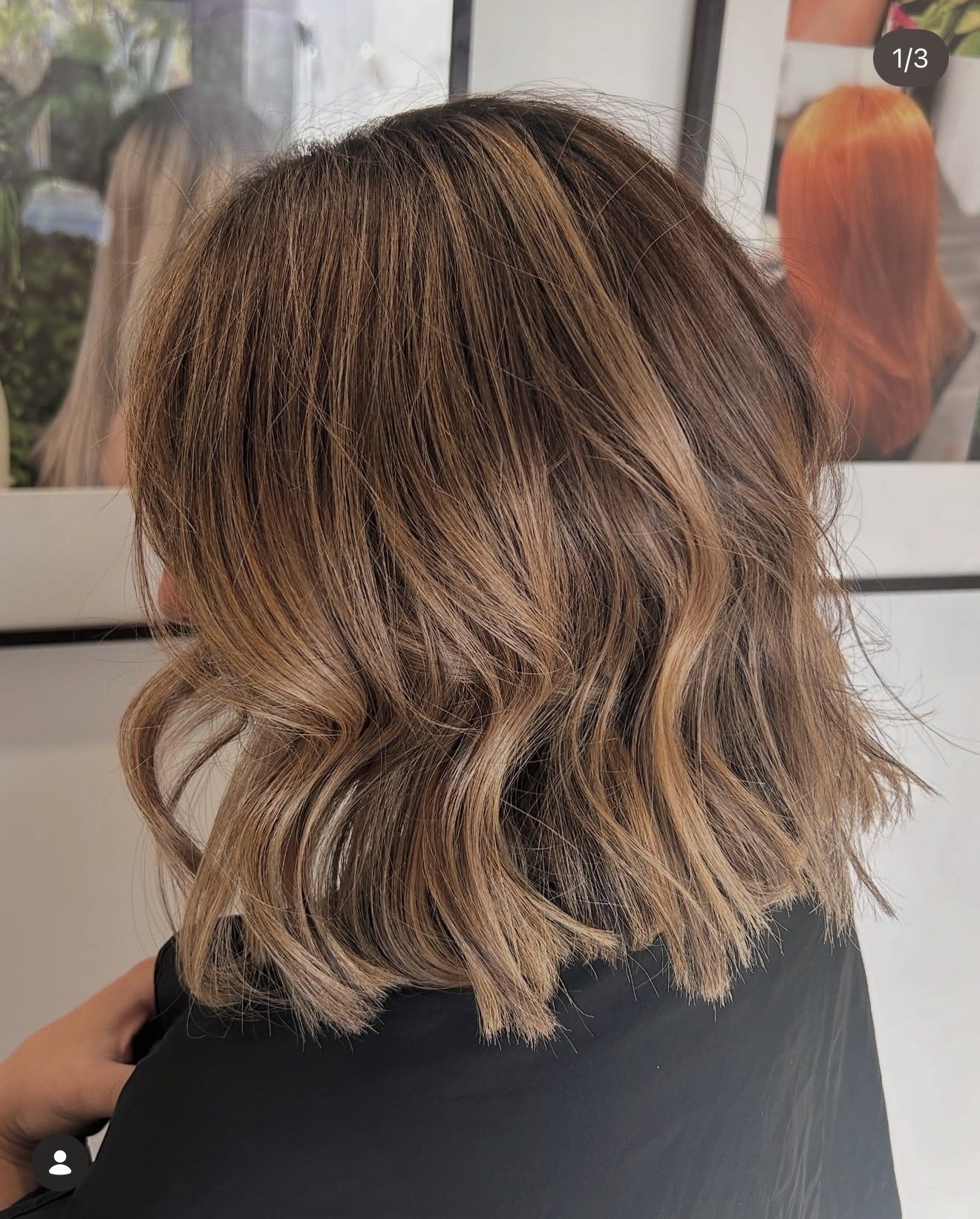 Finished hair colour with soft waves and warm brunette tones created at Travis Hairdressing
