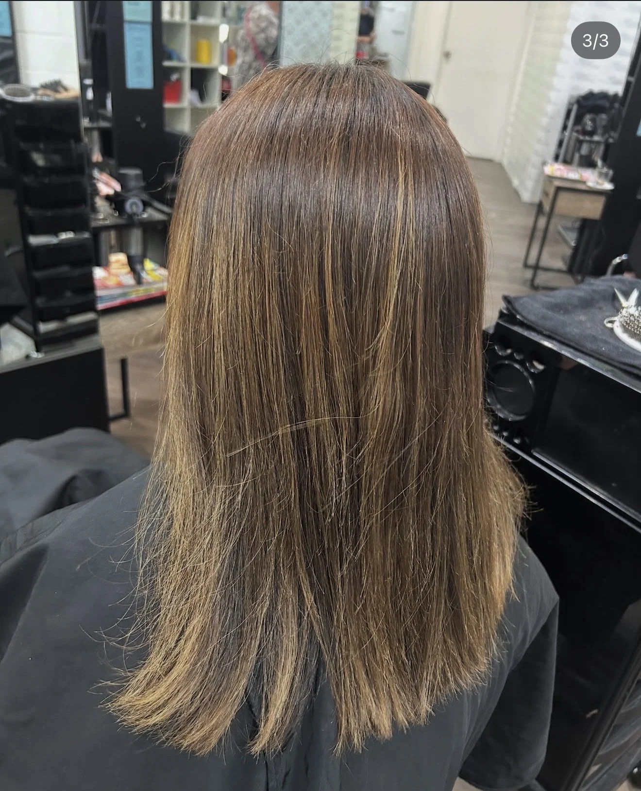 Freshly coloured hair with natural brunette tones at Travis Hairdressing, shown before styling in the Blackwood salon.