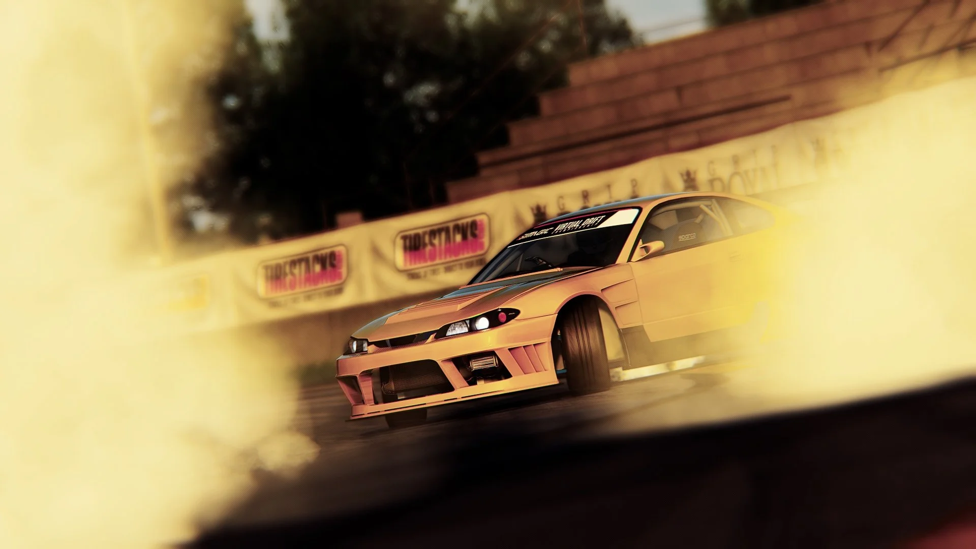 A yellow sports car drifting on a racetrack with smoke, advertising banners in the background, during what appears to be sunset.