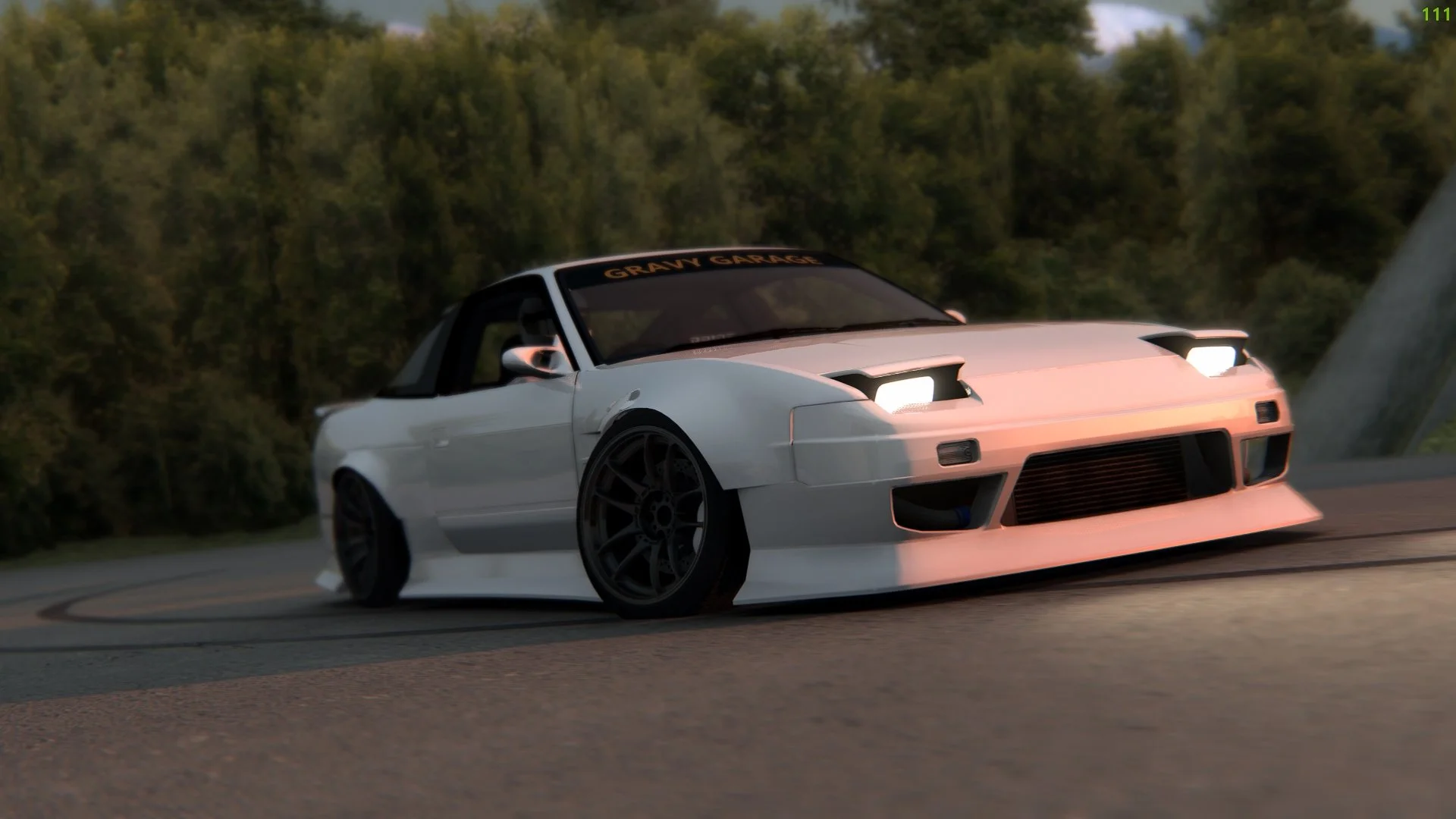 A white sports car with black wheels drifting on a road, with trees and a bridge in the background during sunset.