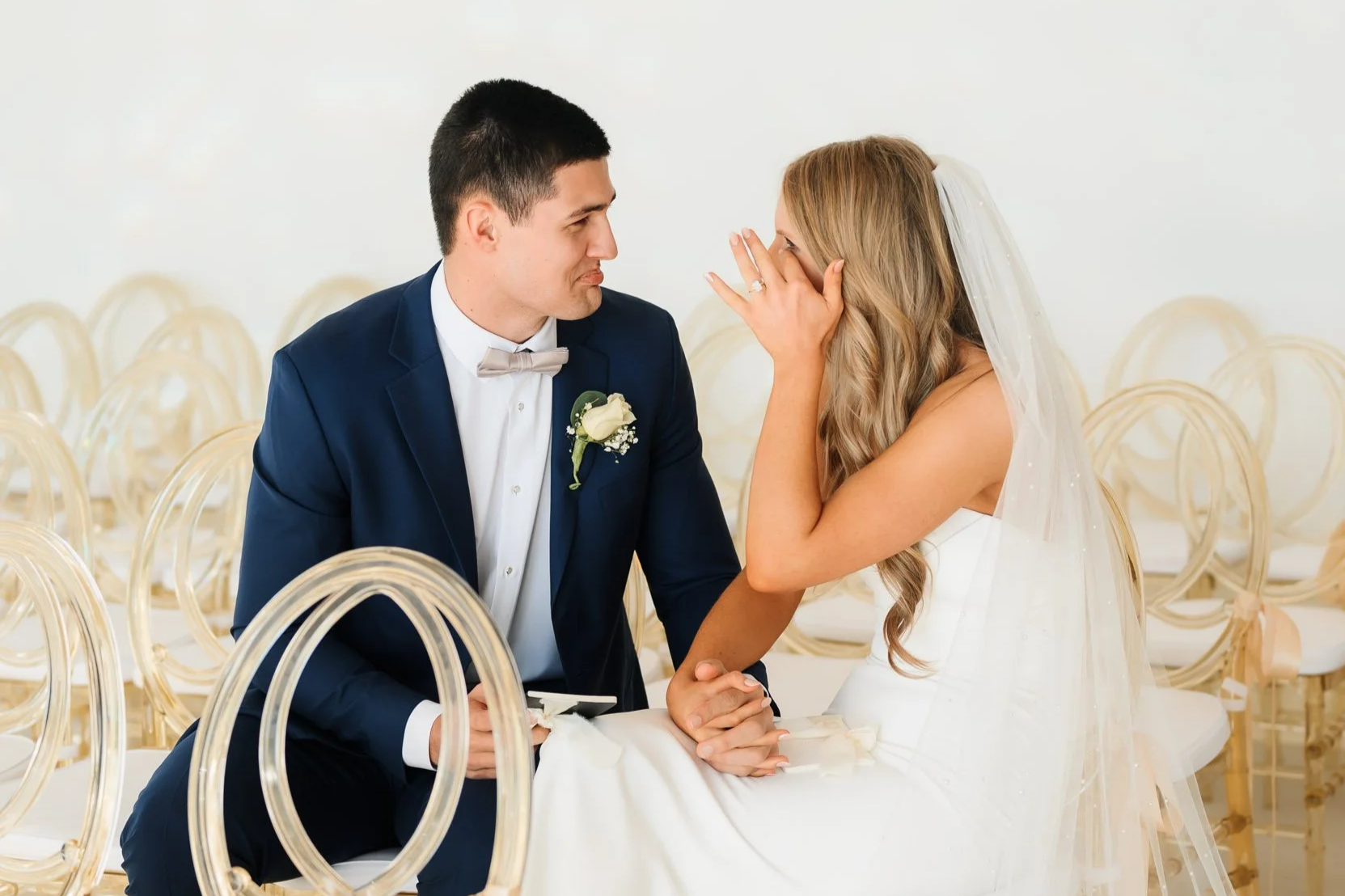 Bride and groom sharing private vows inside elegant chapel wedding venue