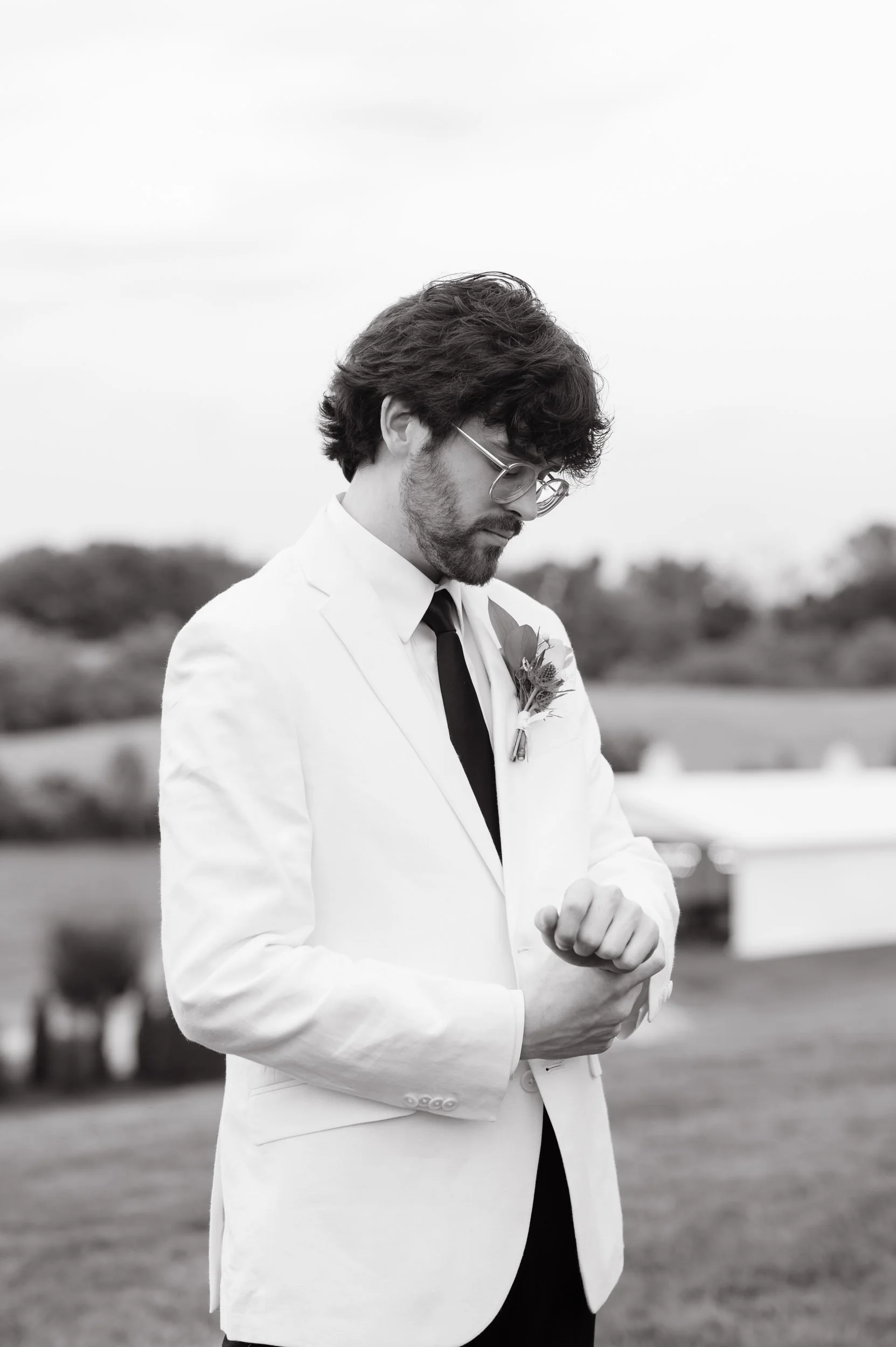 Black and white groom getting ready portrait during Tennessee wedding