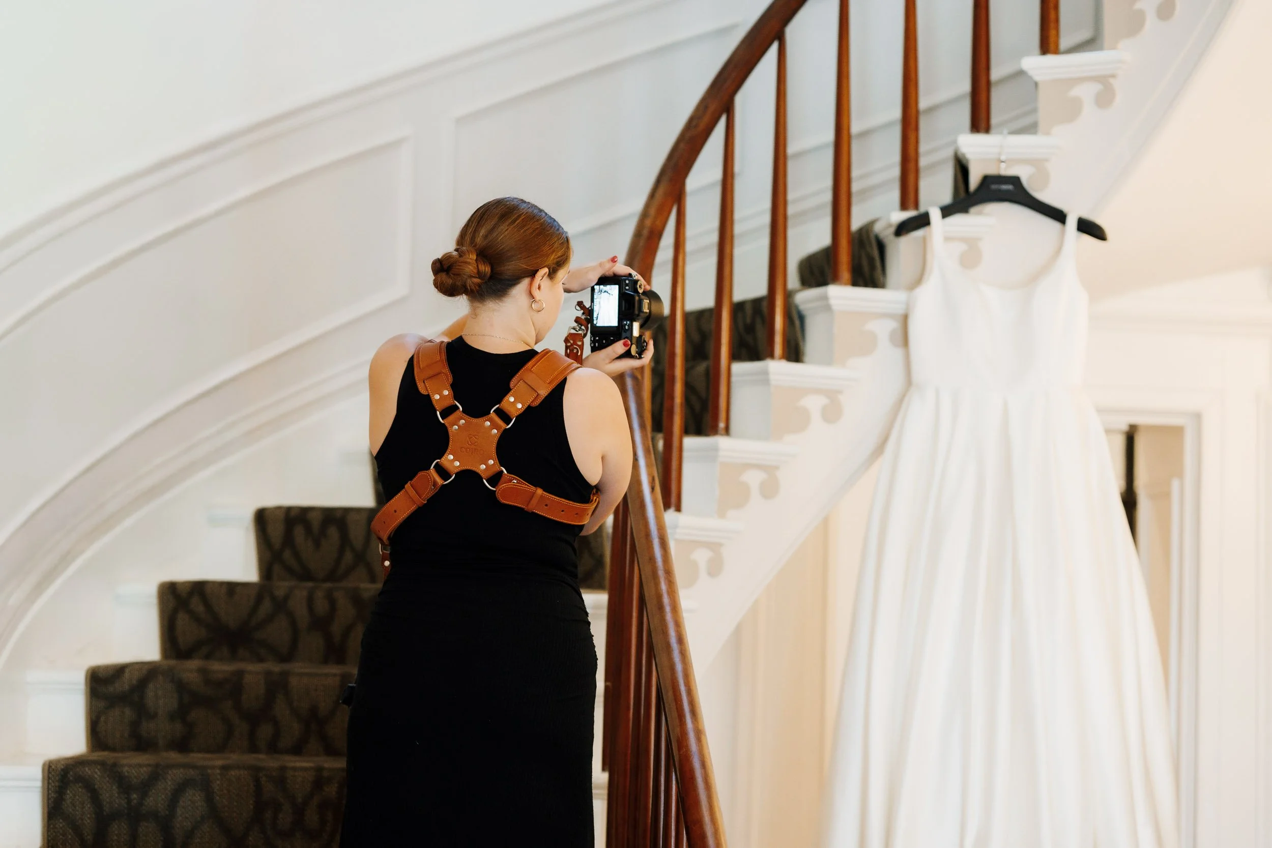 Wedding Photographer taking photo of wedding dress in Nashville TN