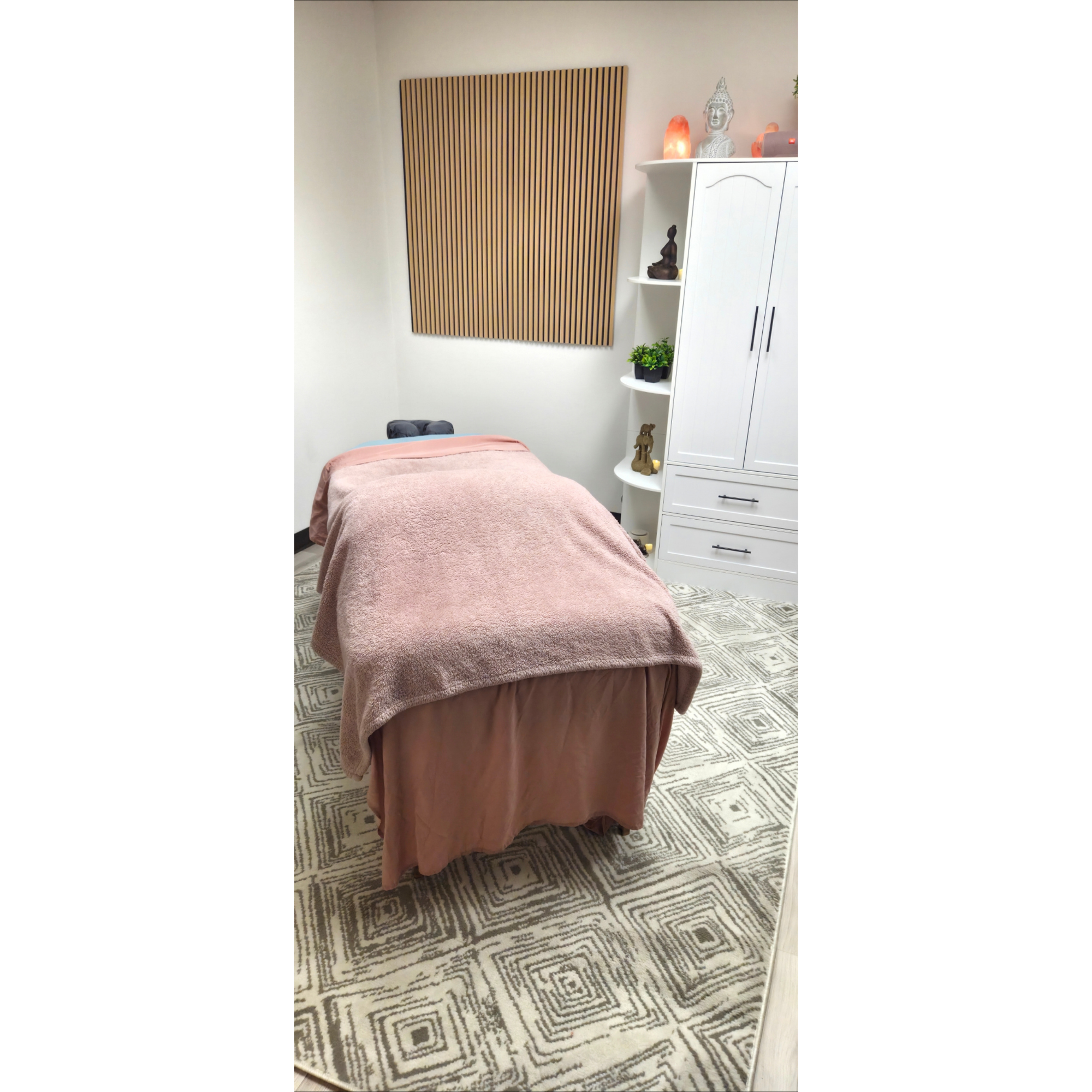 Bright private treatment room prepared for Swedish massage in East Tucson