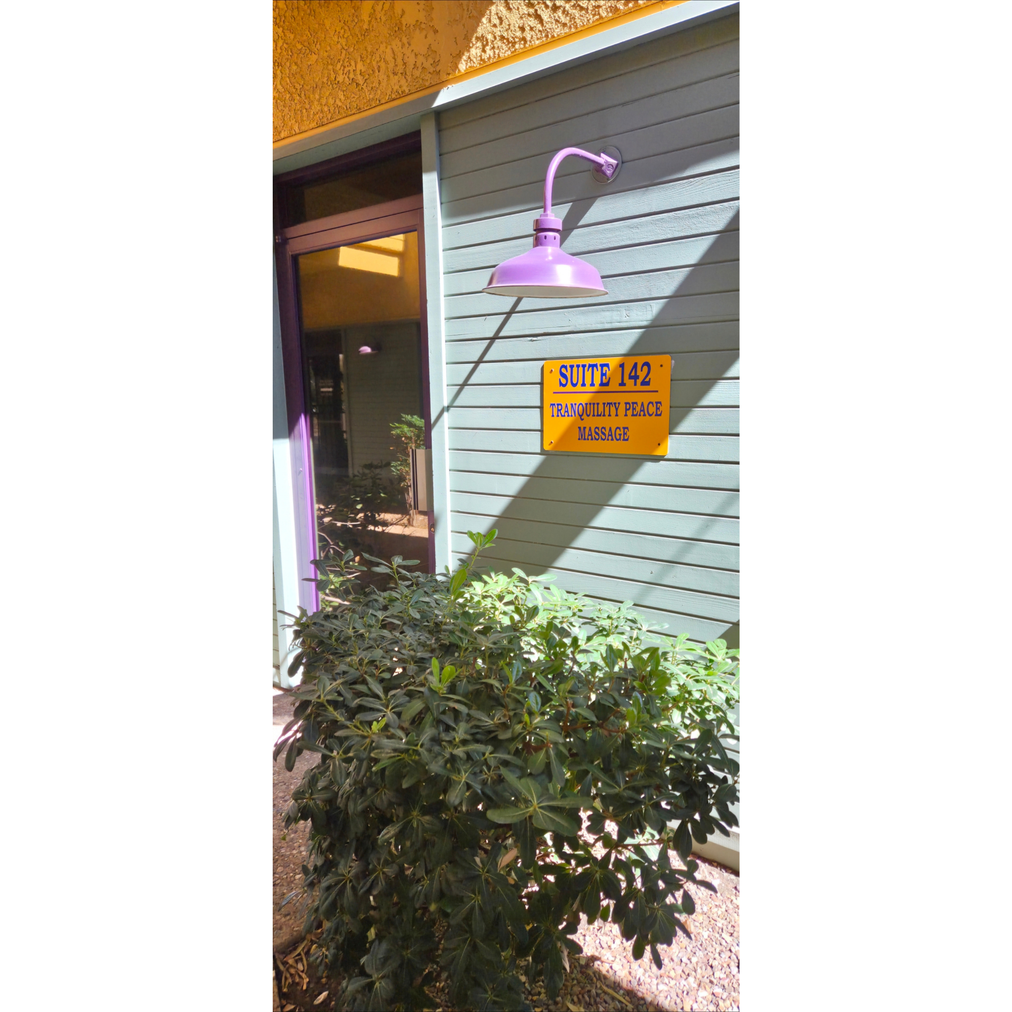 Exterior entrance and suite sign at Tranquility Peace Massage in East Tucson.