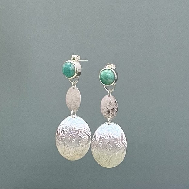 Amazonite gems with silver embossed textured pendants. Sterling silver stud style earrings