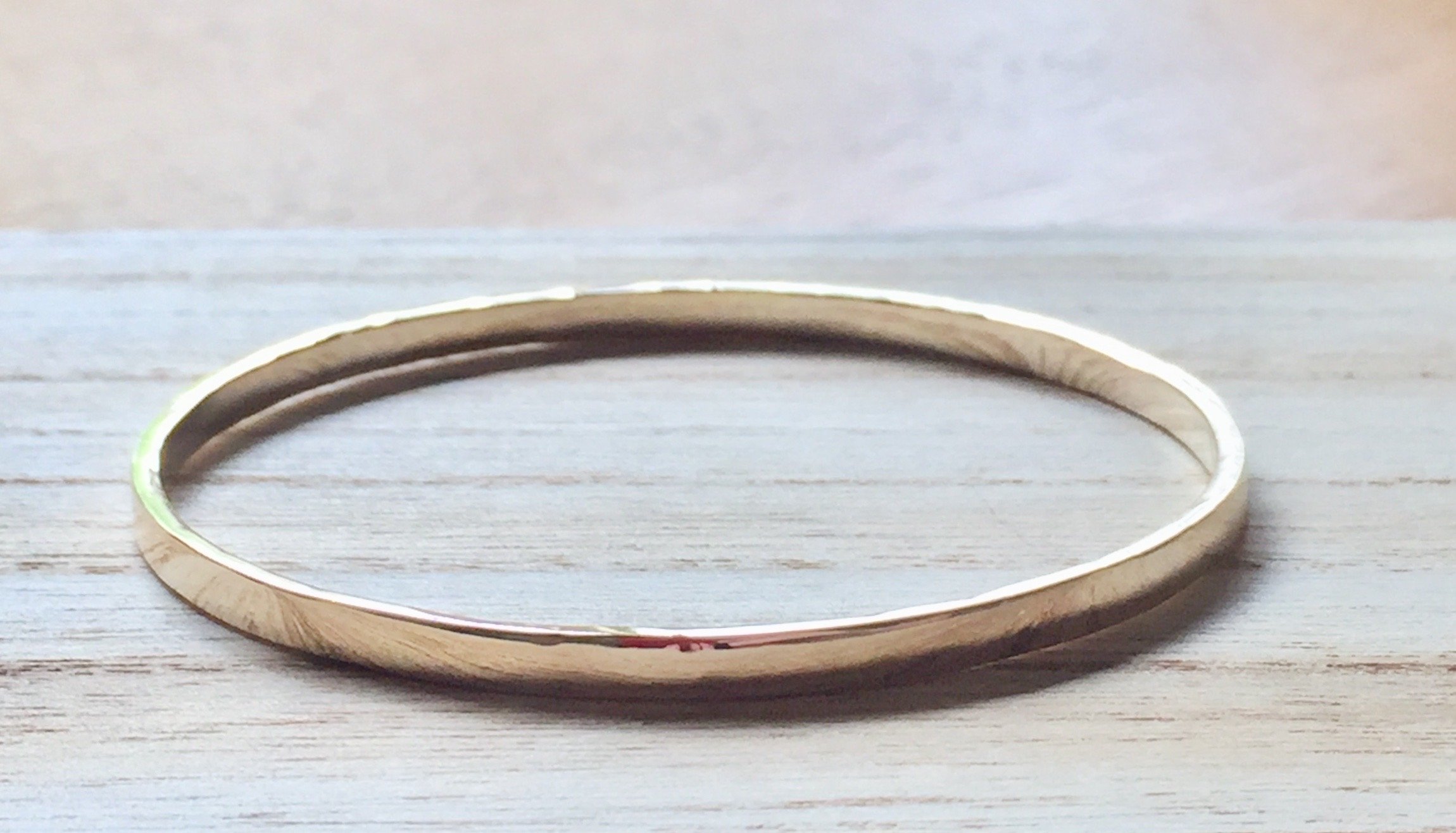 14ct gold bangle made from Customers own out of date gold jewellery