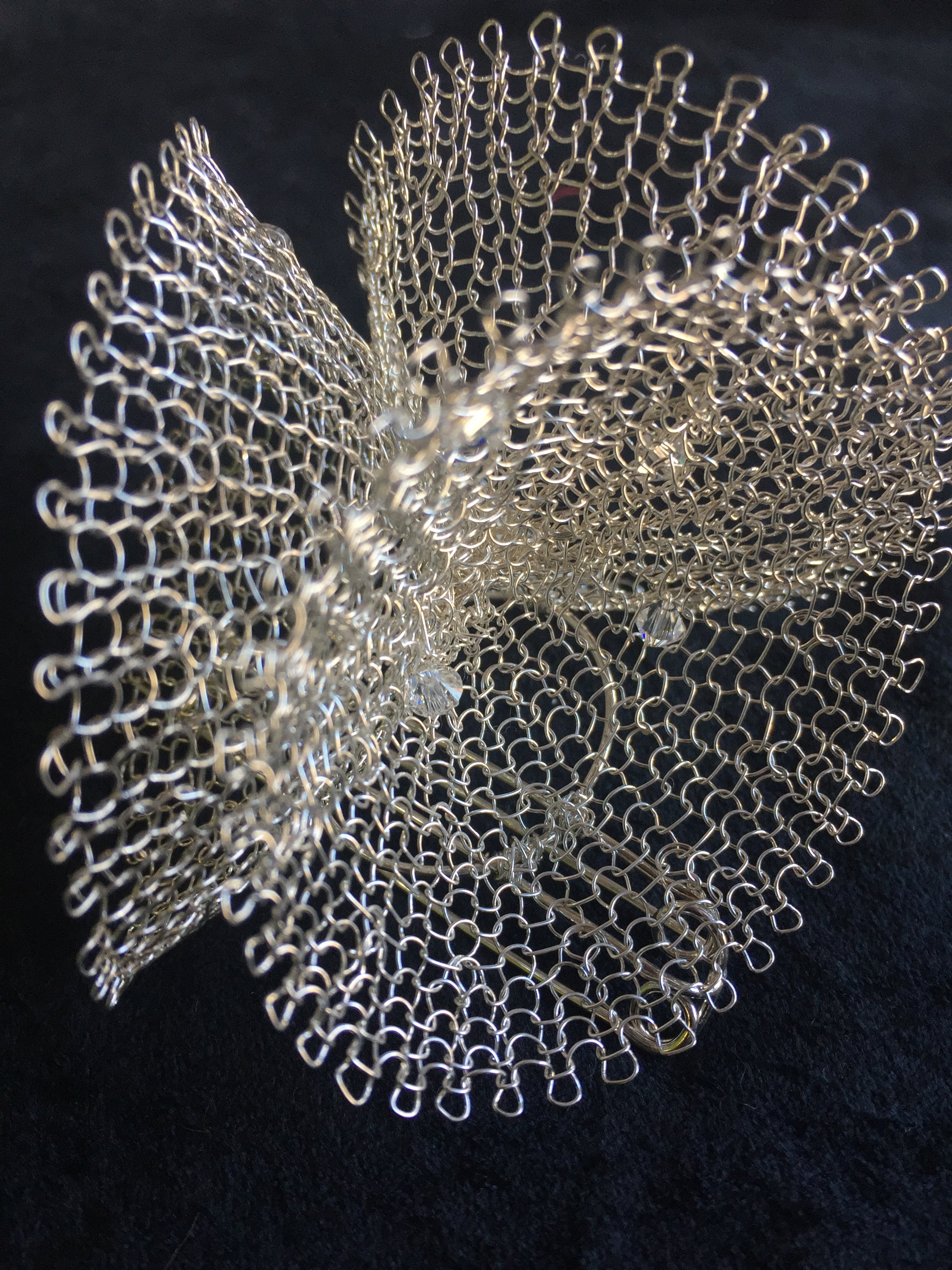 Hand knitted brooch. Custom made fine silver