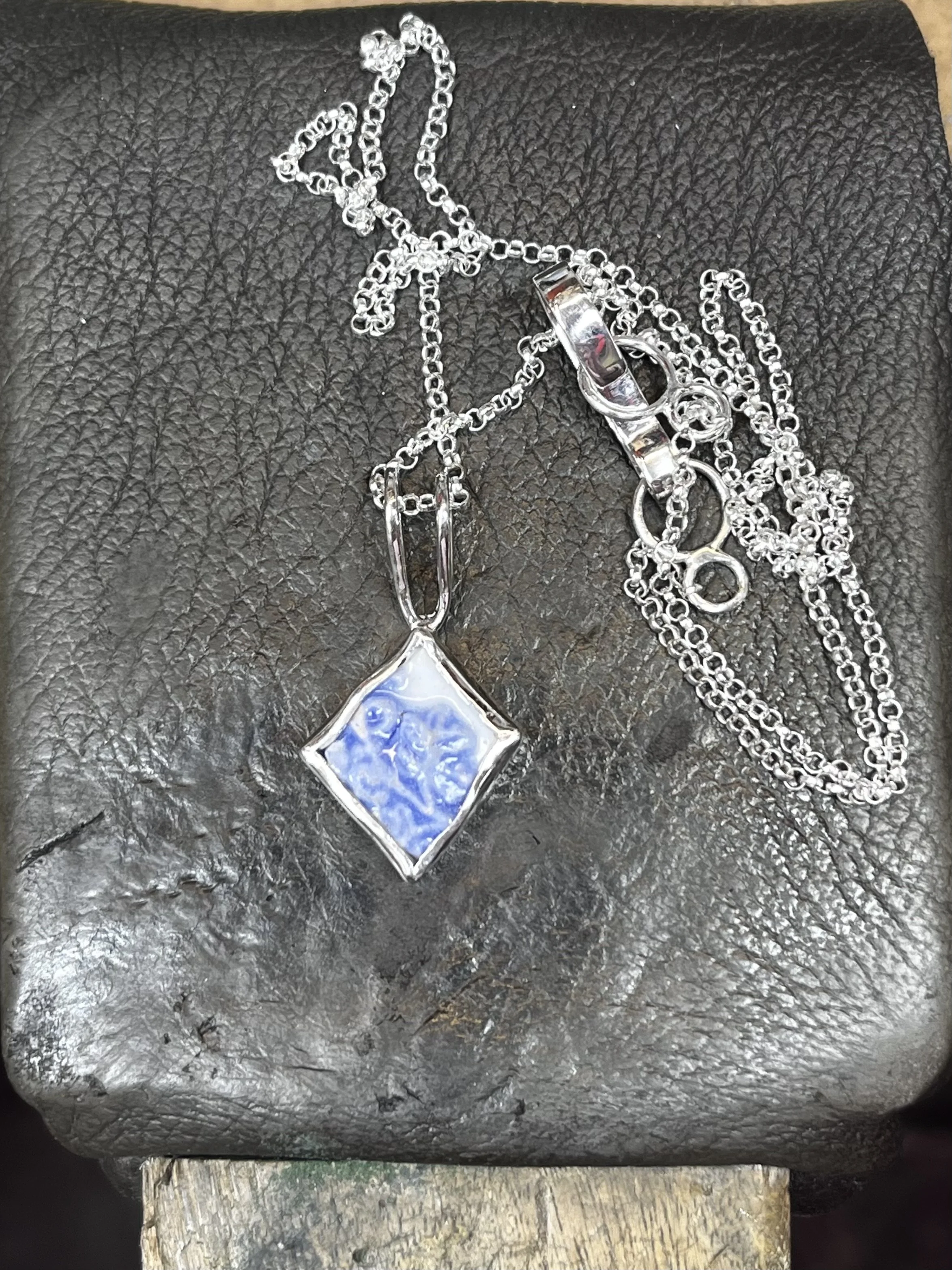 Cussto necklace with portion of found old plate made in sterling silver