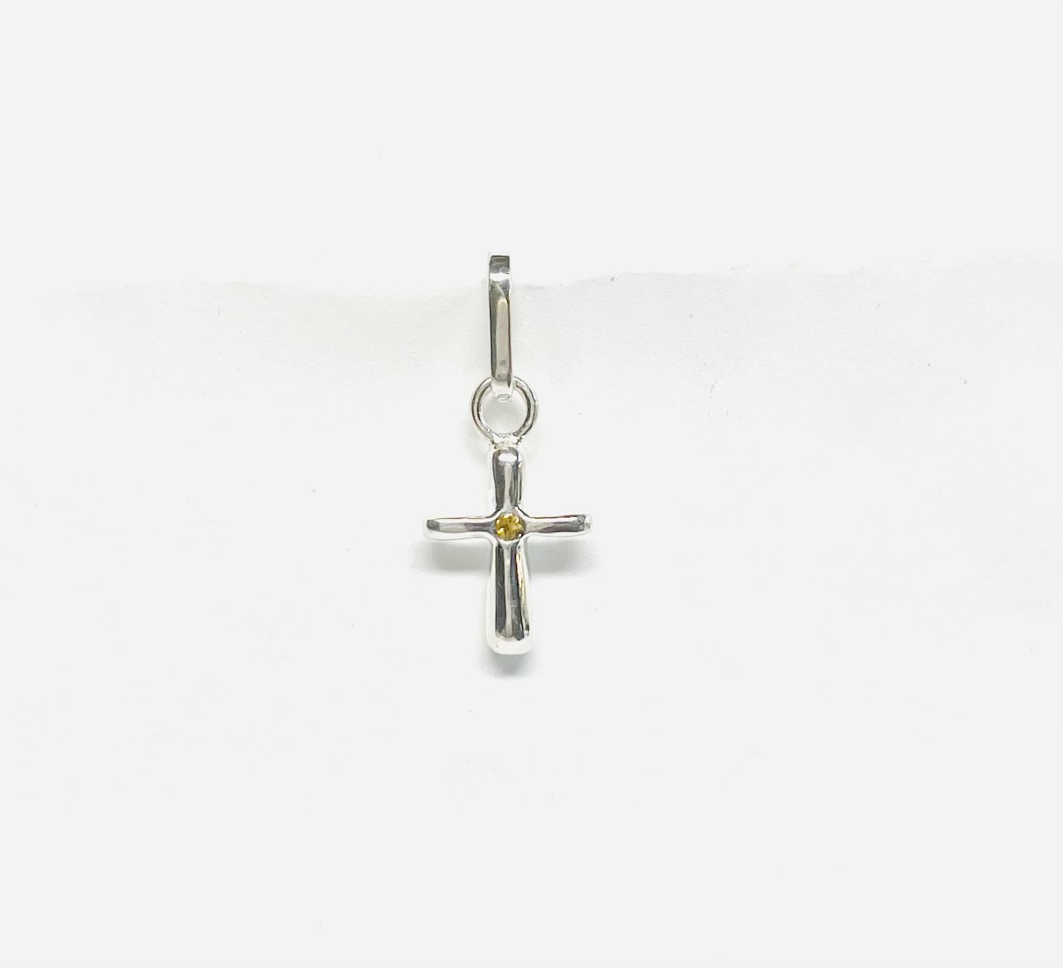 Sterling silver charm. Cross with citrine birth stone
