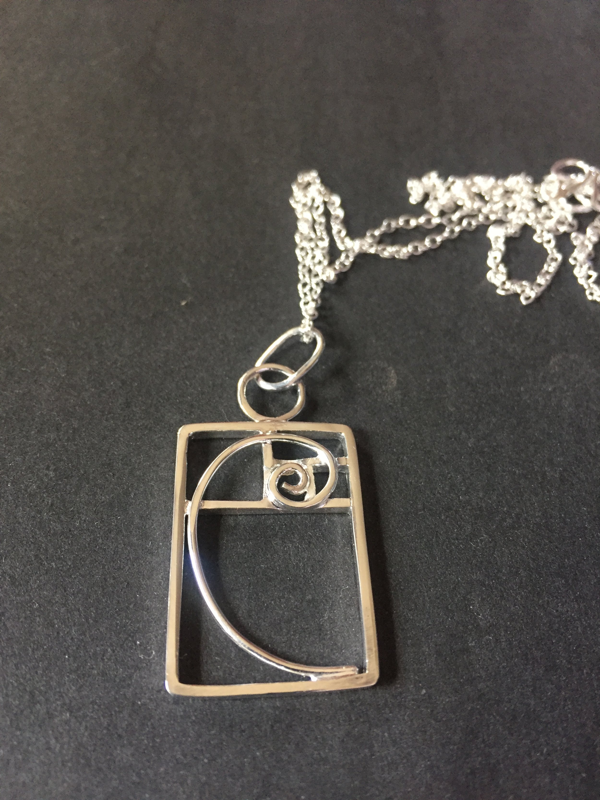 Fibonacci curve necklace. Custom made in sterling silver