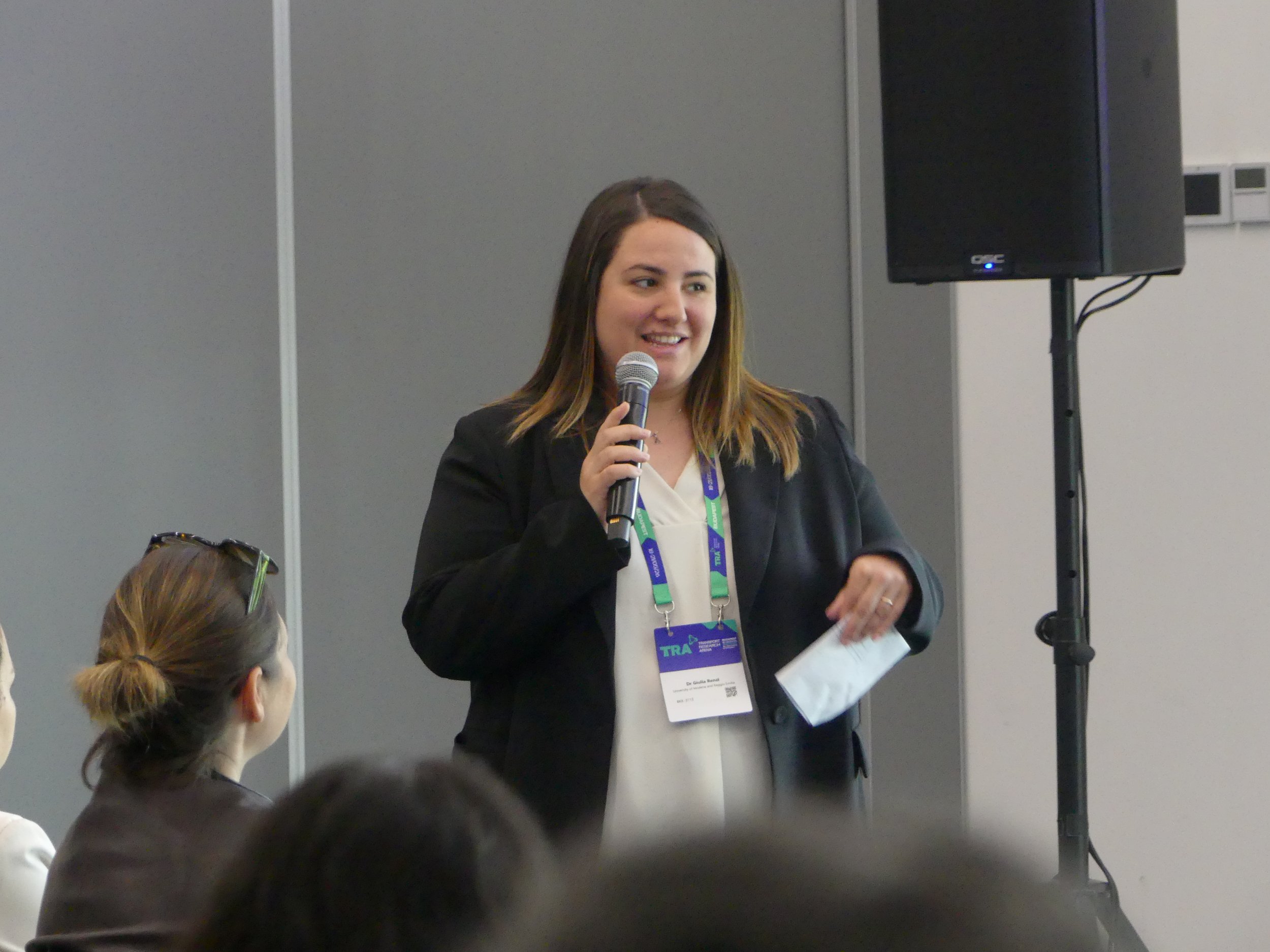 Giulia Renzi moderating Panel II discussions.