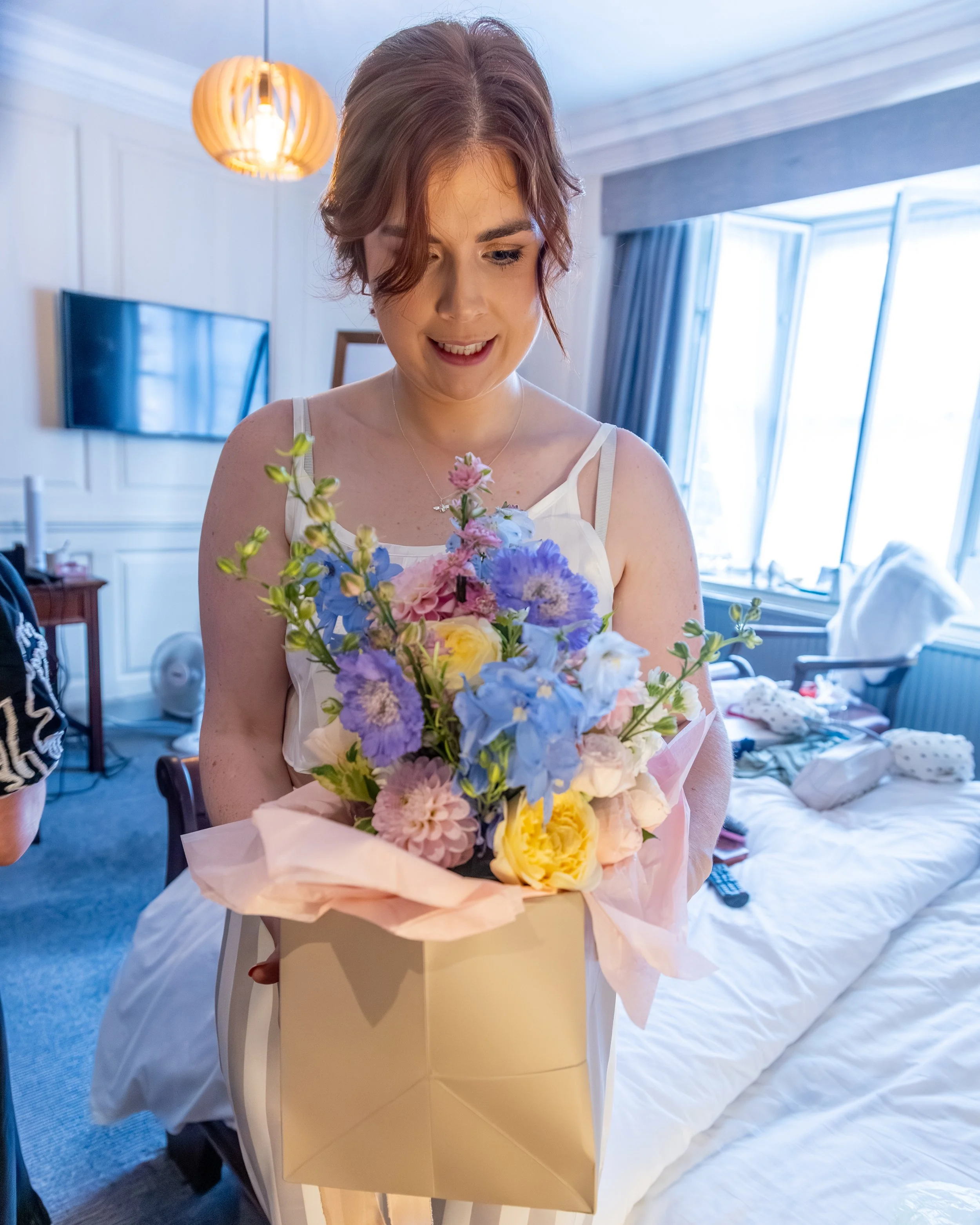 A bridesmaid getting flowers for the wedding