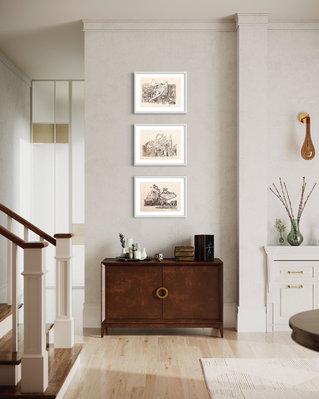 "Vertical arrangement of three framed drawings depicting various Marvel comic book superhero scenes, displayed above an antique wooden cabinet with decorative items, in a light, elegant hallway."