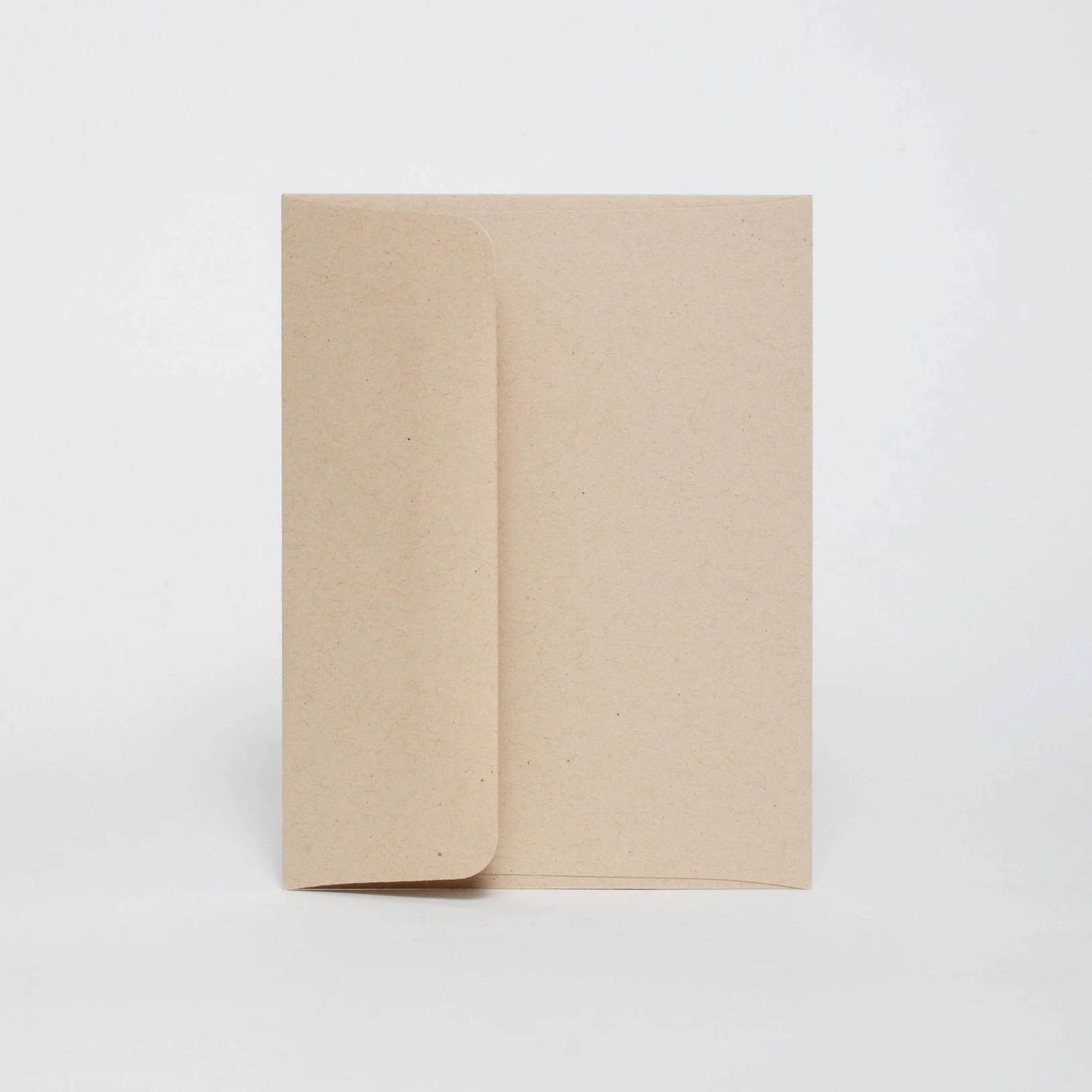Funny shark birthday card shown in plastic-free kraft paper packaging