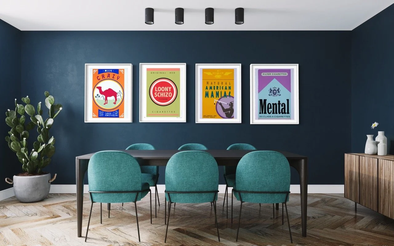 Four colorful pop art posters depicting cigarette packages hang in a blue dining room.