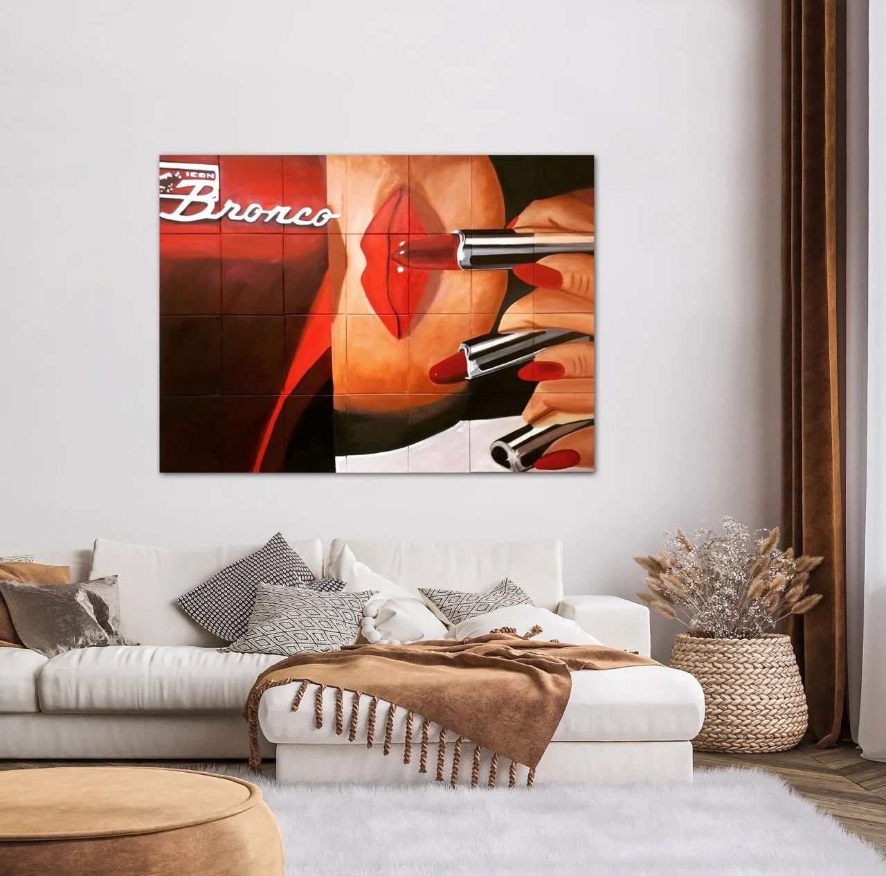Rosenquist style painting of red bronco and a woman applying red lipstick fro multiple tubes with manicured red nails hung above a white couch.