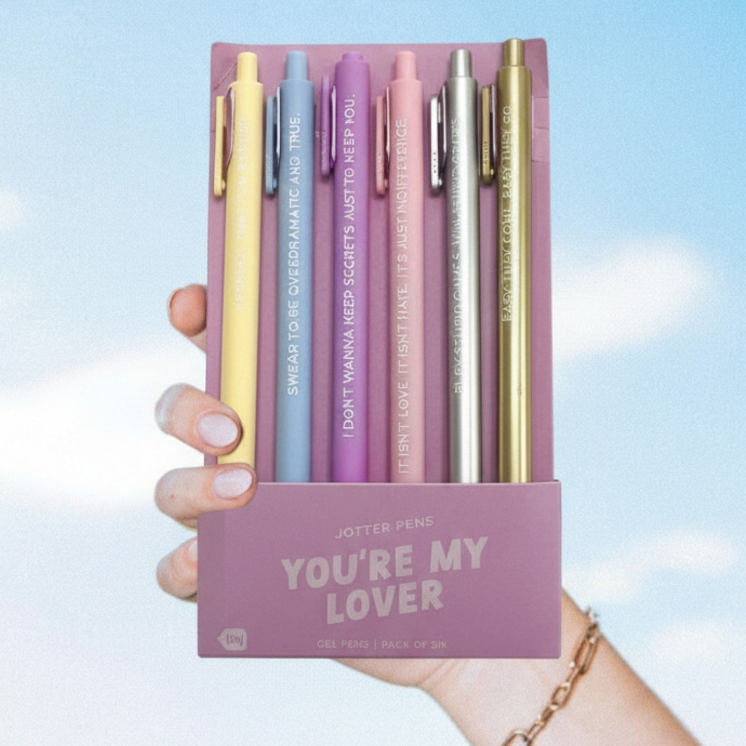 Colorful Swiftie gel pens in “You’re My Lover” packaging, featuring lyrics from Taylor Swift’s Lover album.