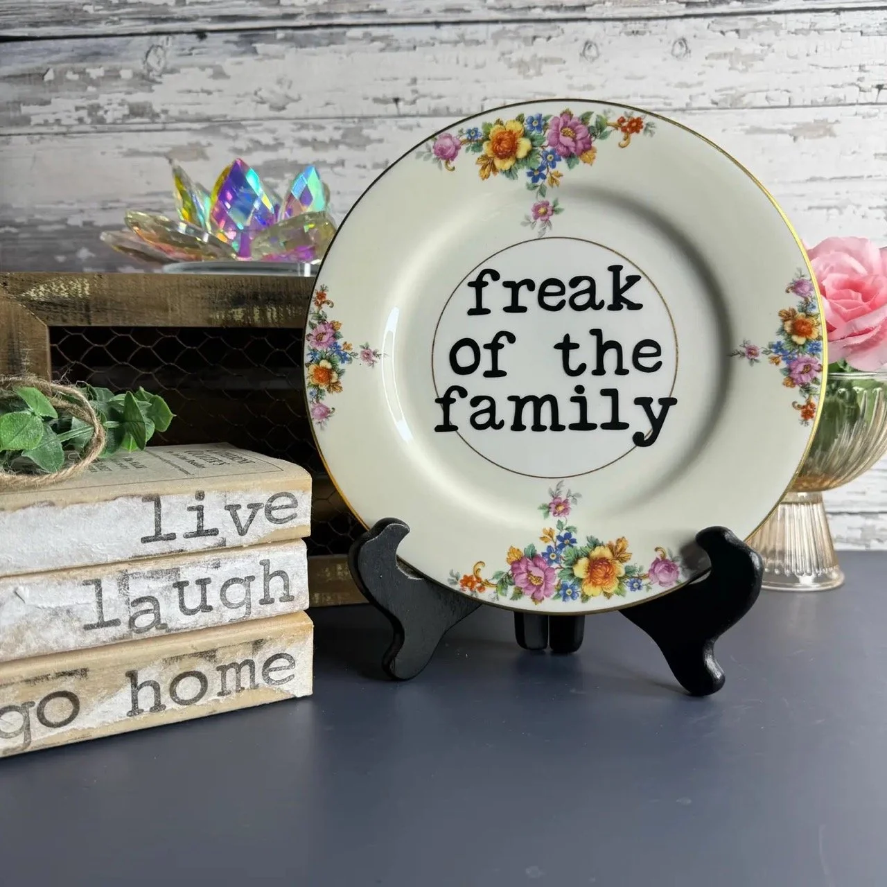 Unique gift idea: vintage-style plate with floral art and humorous text, perfect for playful home decor.