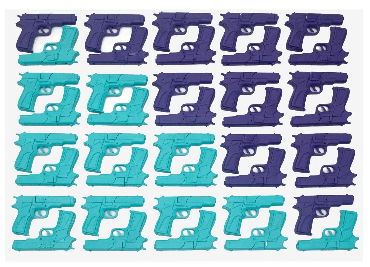 Pop art piece featuring a grid of toy guns in alternating rows of purple and turquoise. The repetitive pattern creates a striking visual contrast between the bold, vibrant colors on a white background.