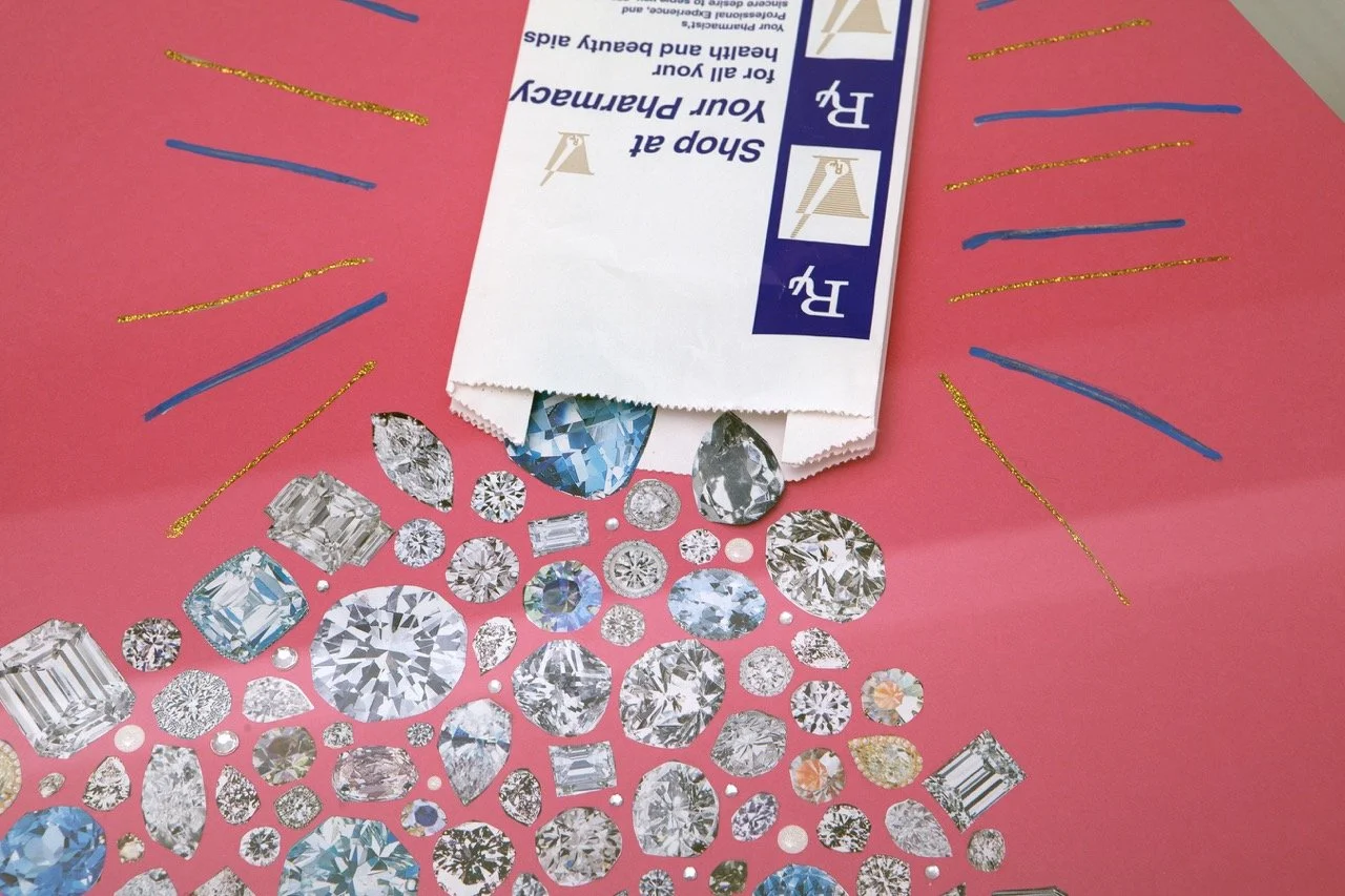 White pharmacy envelope spilling an array of sparkling blue and clear gemstones onto a vibrant pink surface. The background is adorned with blue and gold glitter lines.