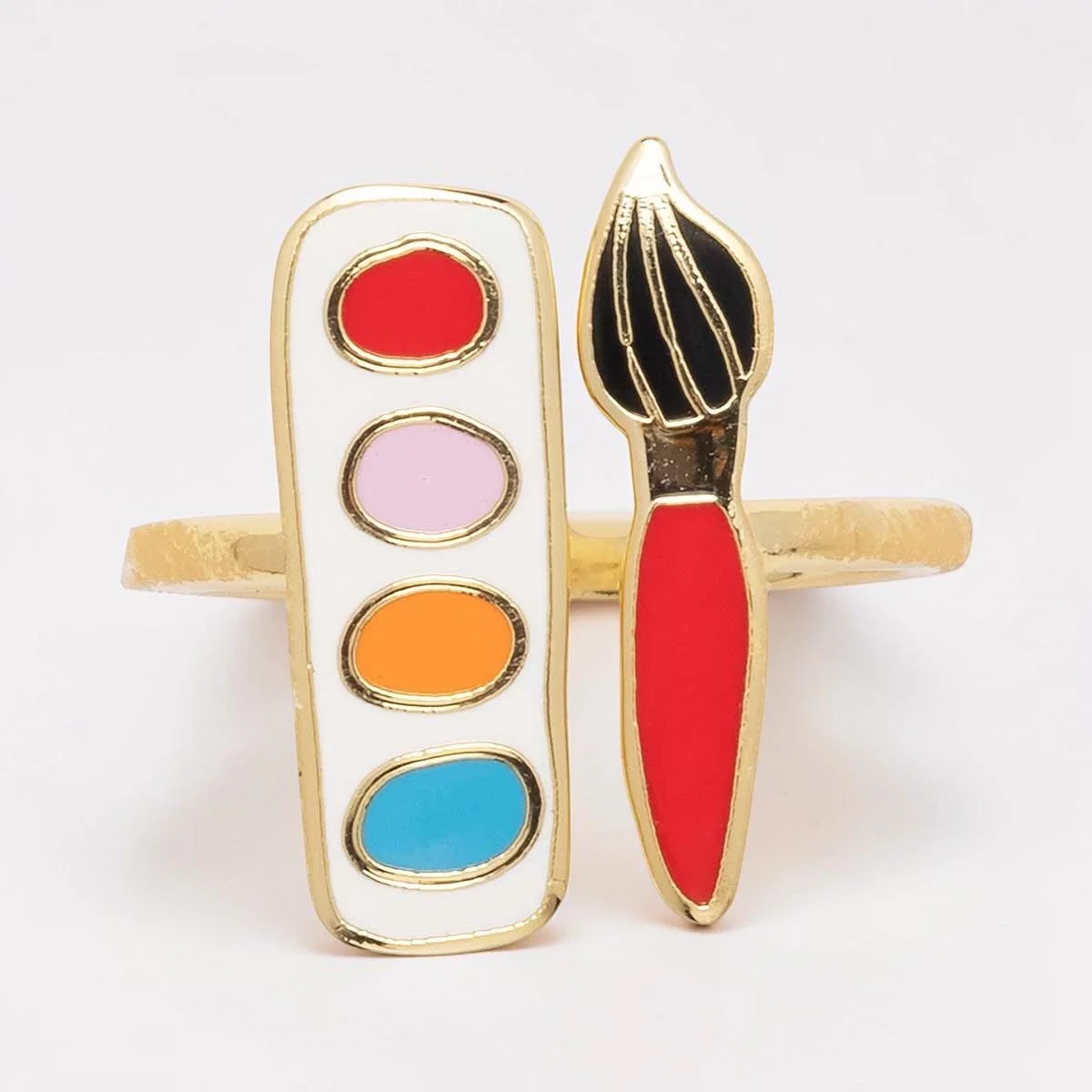 Front view of gold adjustable artist ring with colorful enamel paint palette and paintbrush