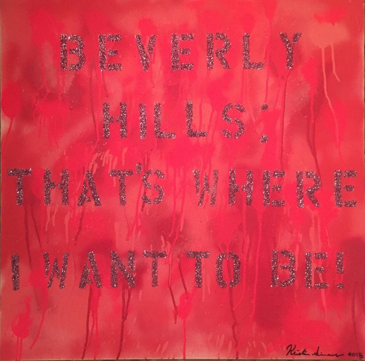 Bold red artwork with glittery text reading "BEVERLY HILLS; THAT'S WHERE I WANT TO BE!" The background features dripping red and pink paint, creating a dynamic and textured effect. Artist's signature in the bottom right corner.