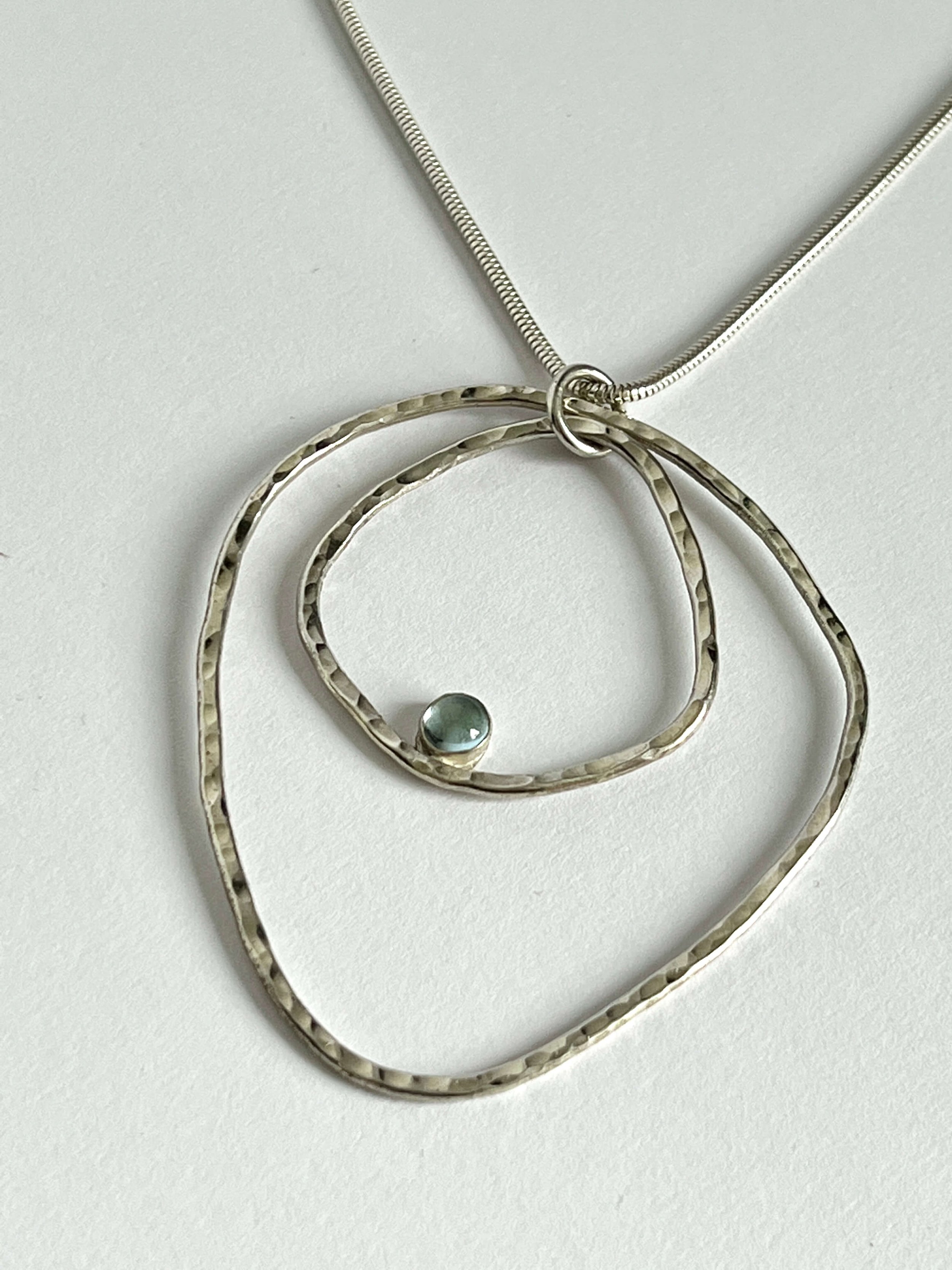 Concentric Circles Silver Pendant with Gem stone
