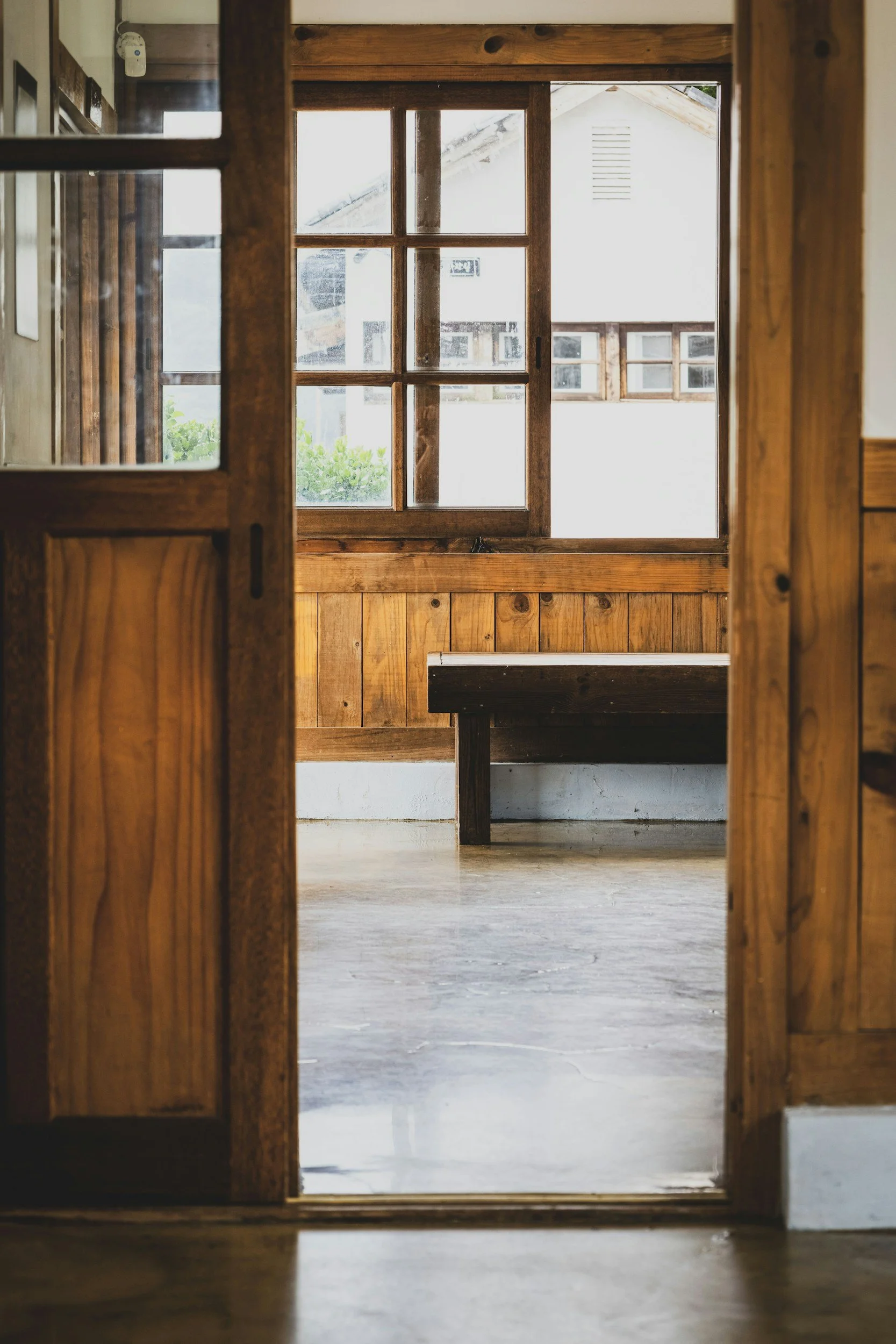 Bright open doorway symbolizing a welcoming entry to relational and compassionate therapy at Here We Are Therapy.