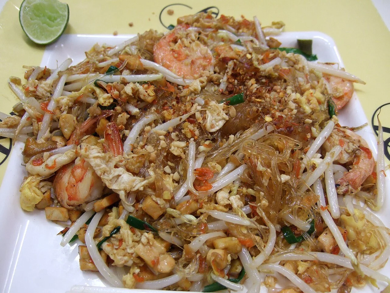 Pad Woon Sen glass noodles with shrimp, shown as a photo example; recipe uses tofu