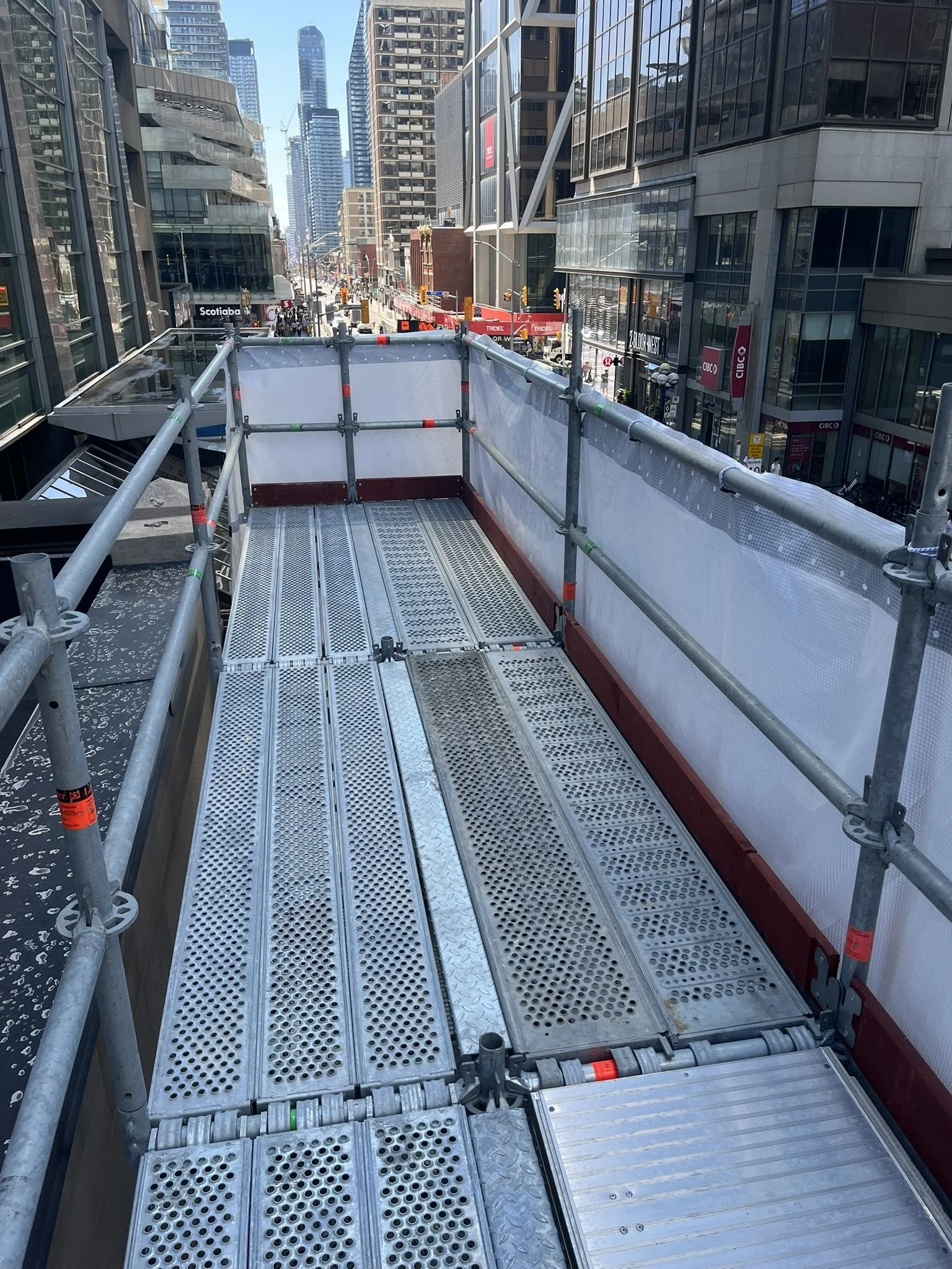 Top of rental scaffold facing south on Yonge St in downtown Toronto