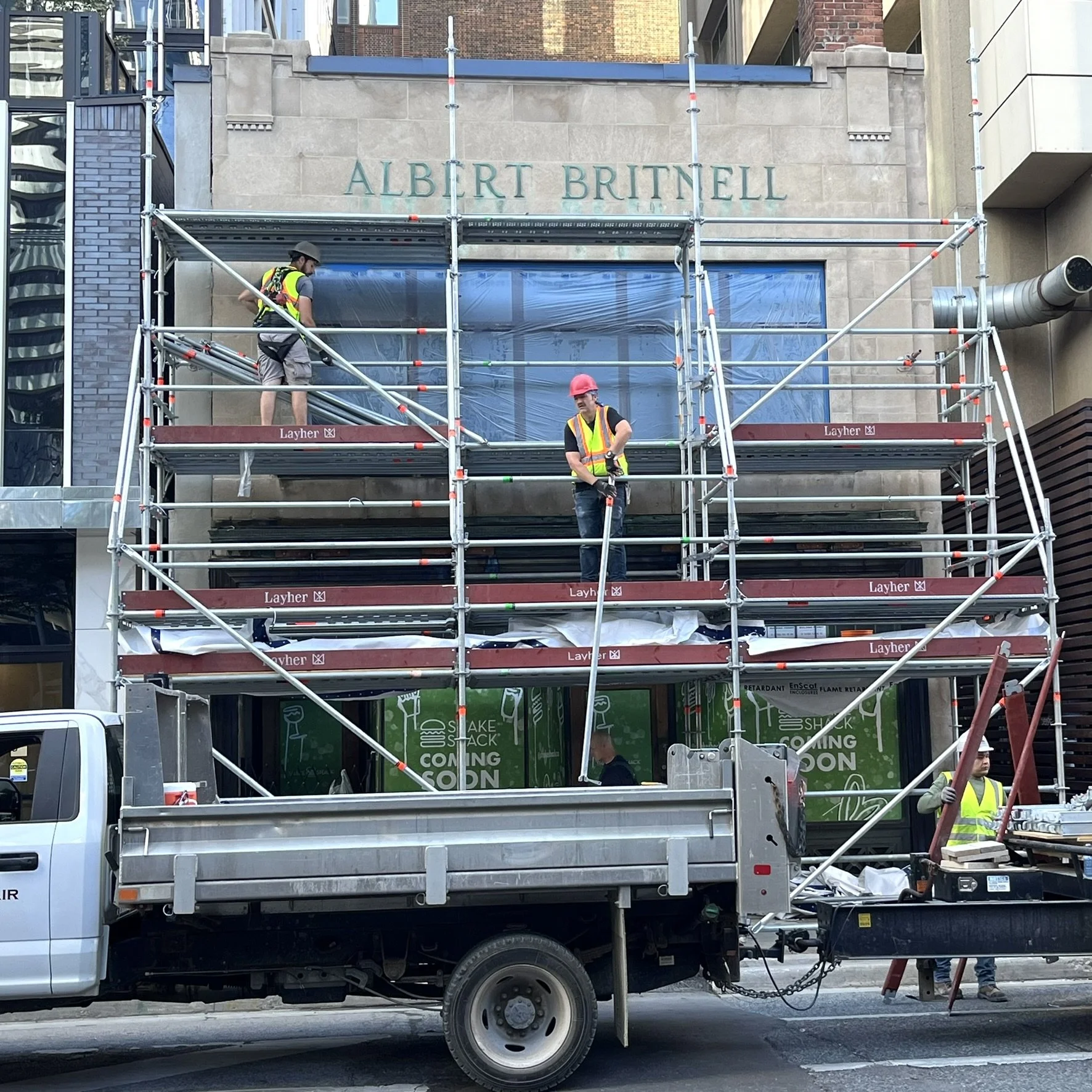 Scaffolding dismantle over pedestrian access on busy Toronto street