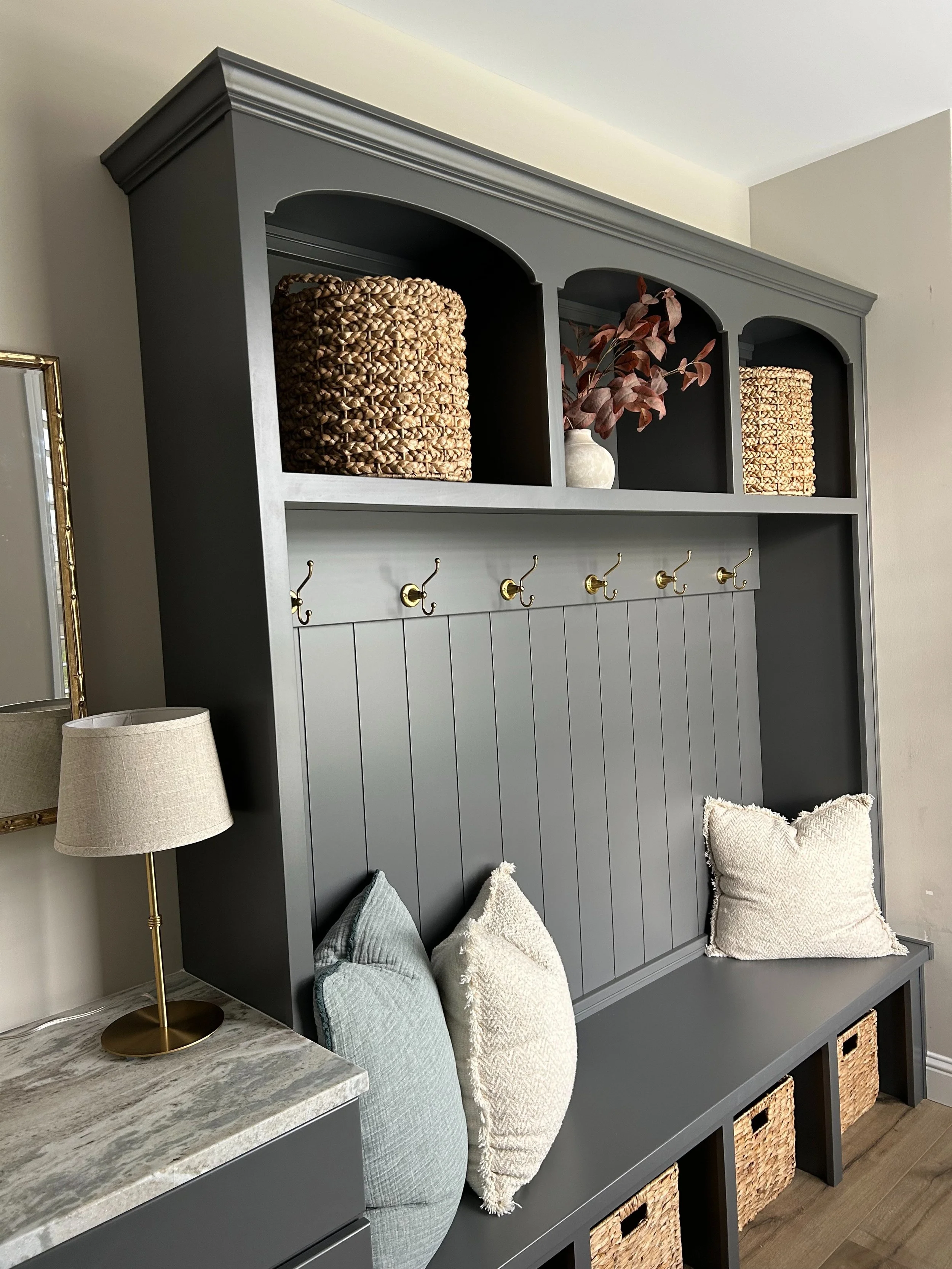 Gray hall tree with hooks and open shelves, custom cabinets, Missouri cabinet maker.