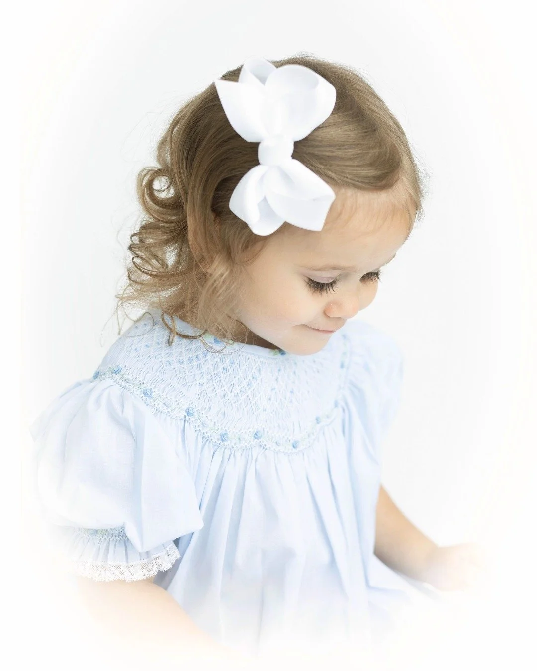 What your child wears matters because it becomes part of the story we&rsquo;re preserving.
Soft textures.
Timeless silhouettes.
Neutral, thoughtful tones.
Heirloom wardrobe isn&rsquo;t about trends.
It&rsquo;s about creating artwork that will still f