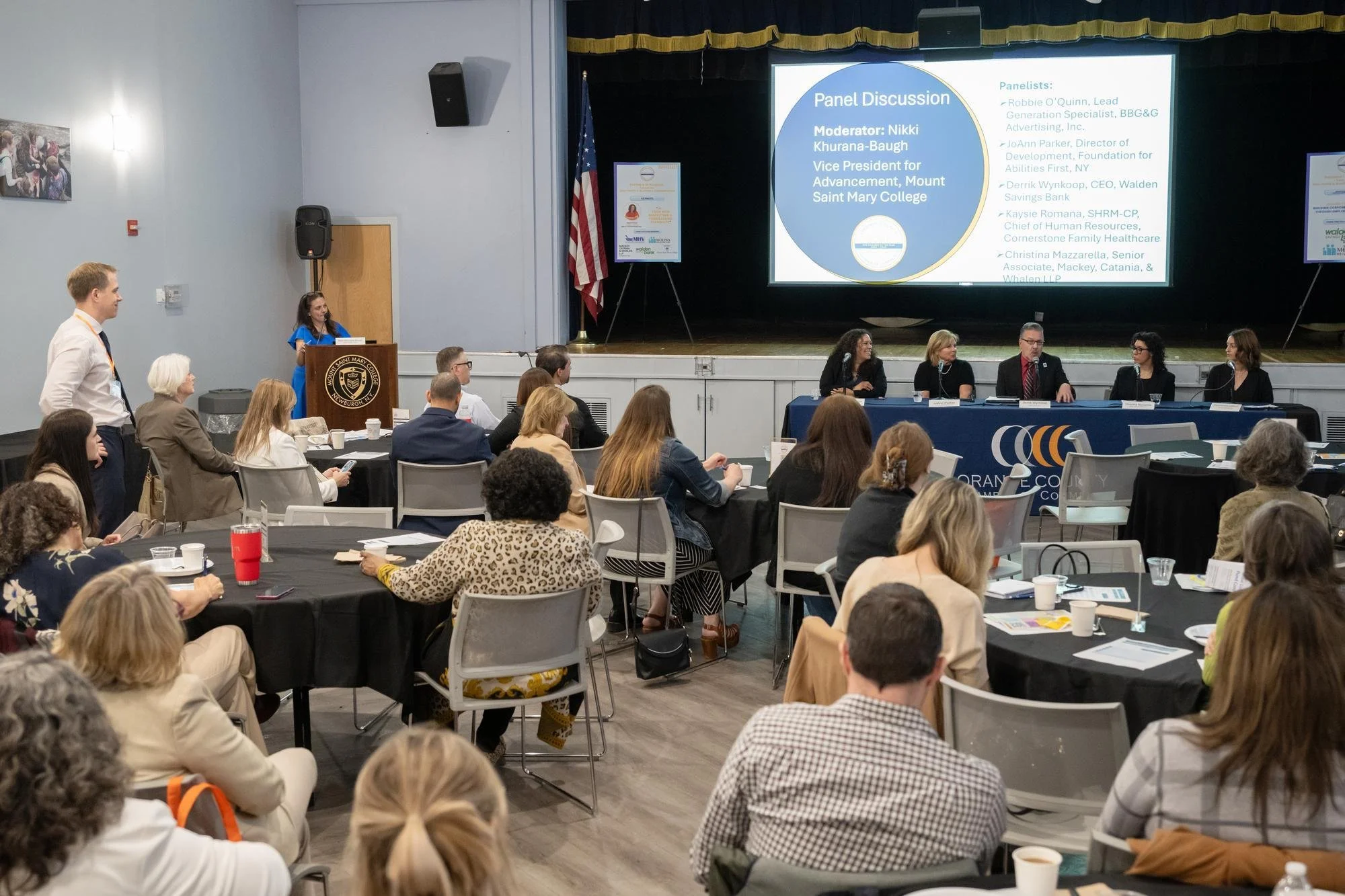   Nikki Khurana-Baugh, Vice President for Advancement, moderates the panel discussion during the “Partners in Purpose” forum. Seated from left to right are panelists Robbie O’Quinn, Lead Generation Specialist, BBG&amp;G Advertising, Inc.; JoAnn Parke