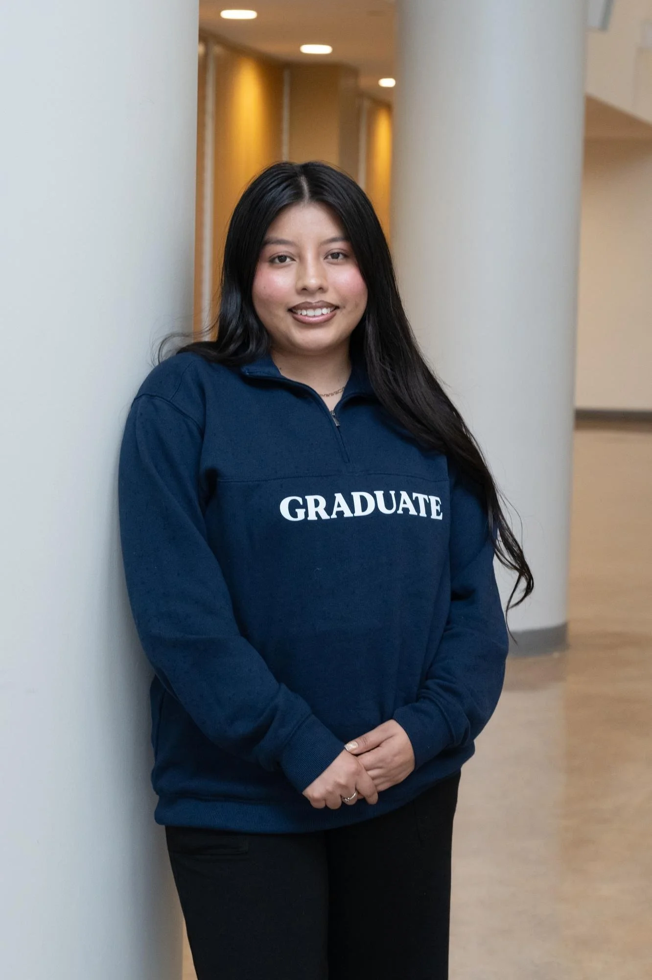 Grad overcomes language barriers through Accounting, leadership excellence