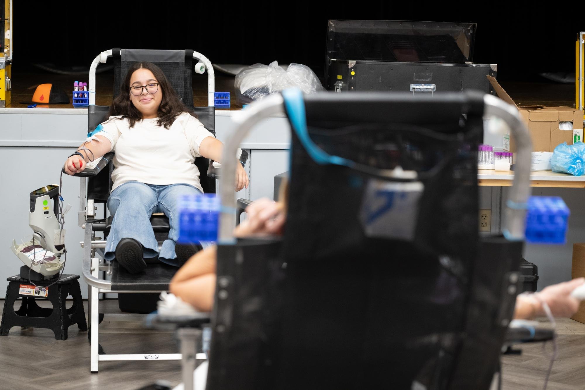  Mount student Melanie Chaclan, a junior Business Administration major, donates blood.  