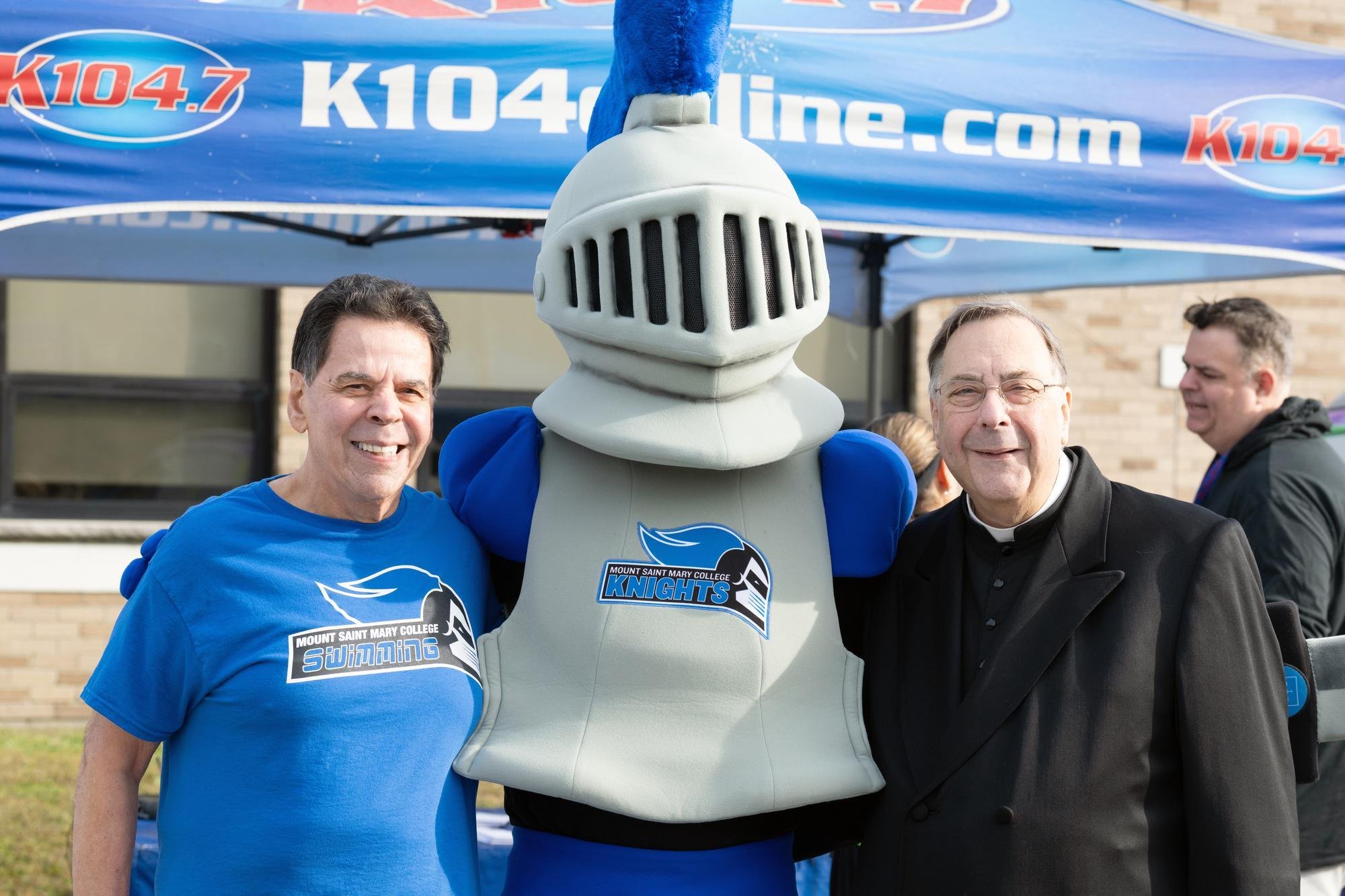   Mount President Dr. Robert Gervasi, Fr. Gregoire Fluet, Vice President for Mission and Ministry and Campus Chaplain, and their pal, Mack the Knight, were VIPs at the 7th Annual Cupcake Run.  