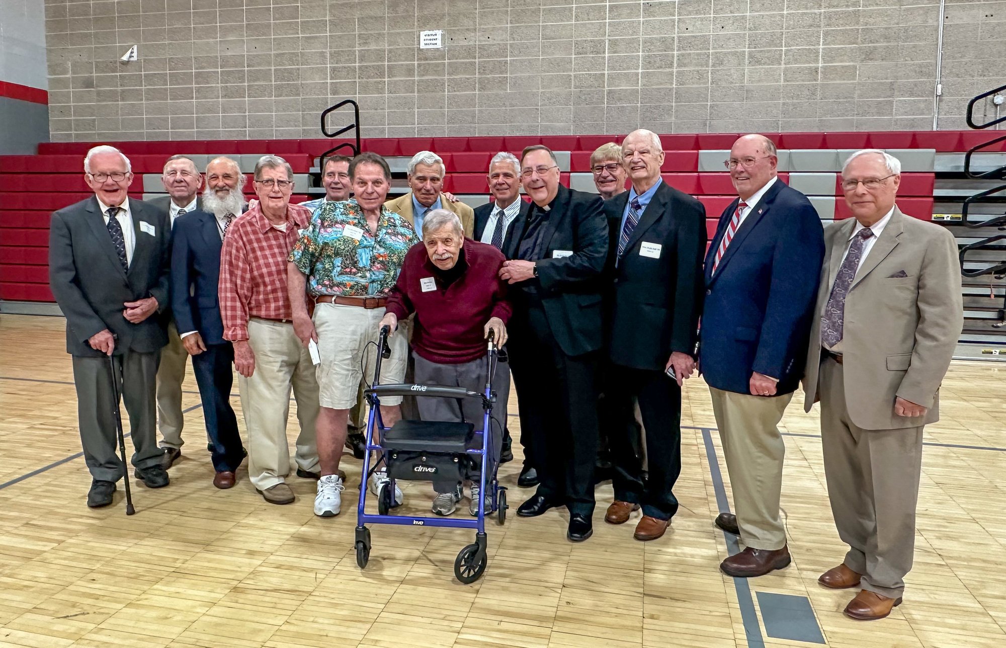 Faculty members from Saint Bernard High School in Uncasville, Conn. who served in the 1980s attended the Athletics Hall of Fame induction. Fr. Gregoire Fluet, Vice President for Mission and Ministry at the Mount, is seen here standing in the center