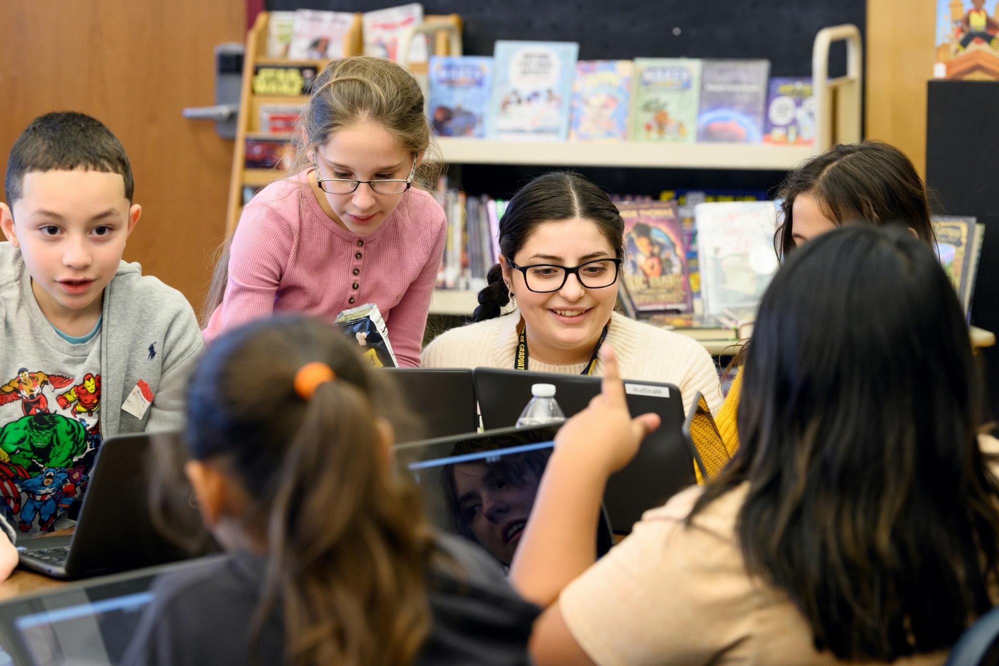   Jaedyn Lewis, a Human Services major, works with students from the Highland Falls Intermediate School during the CONNECT after-school program.  