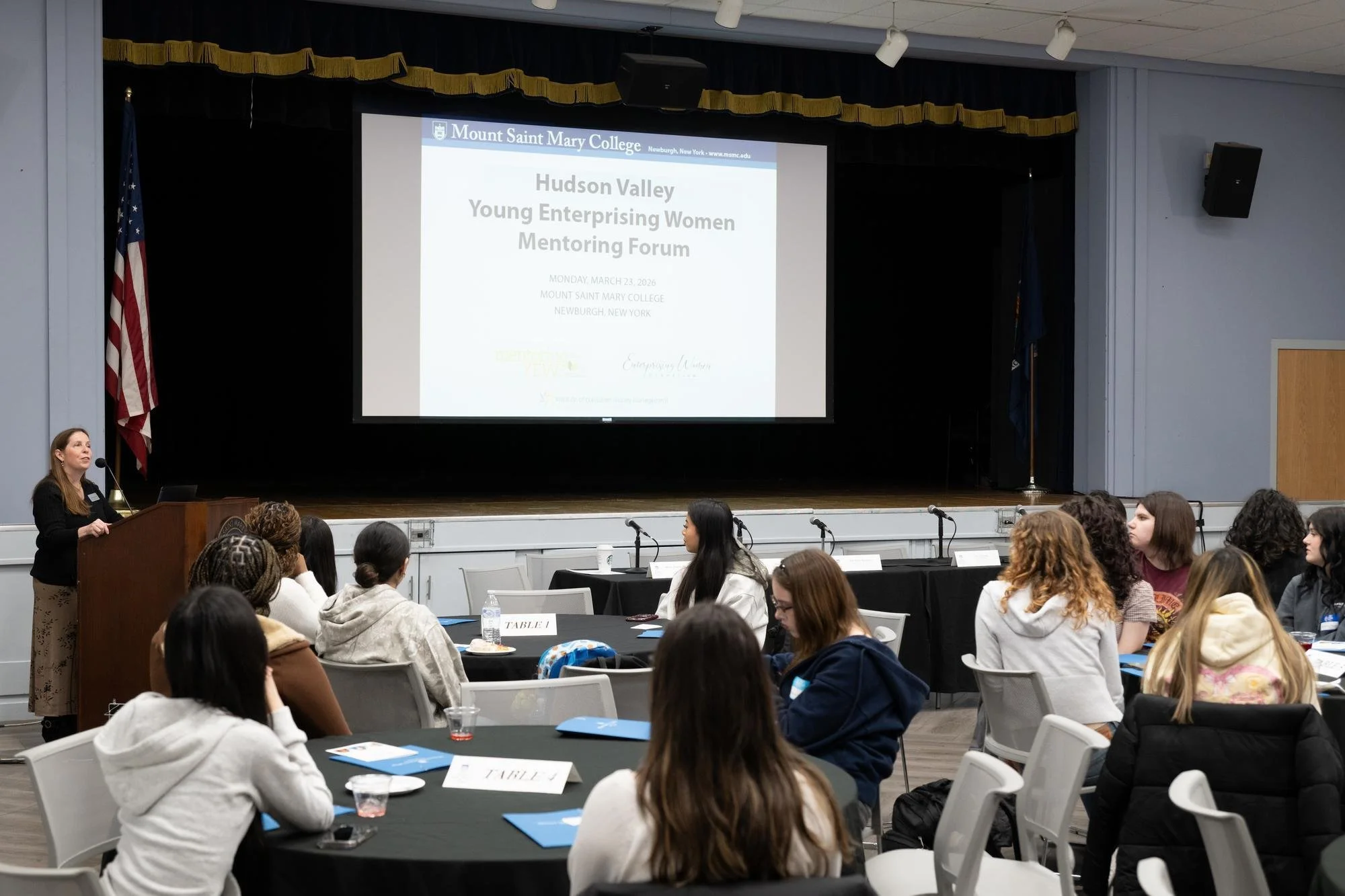   Jennifer Bready, Dean of the School of Arts, Sciences, and Education and Professor of Mathematics at Mount Saint Mary College, mentors high school students during a roundtable session at the Hudson Valley Young Enterprising Women Mentoring Forum. B