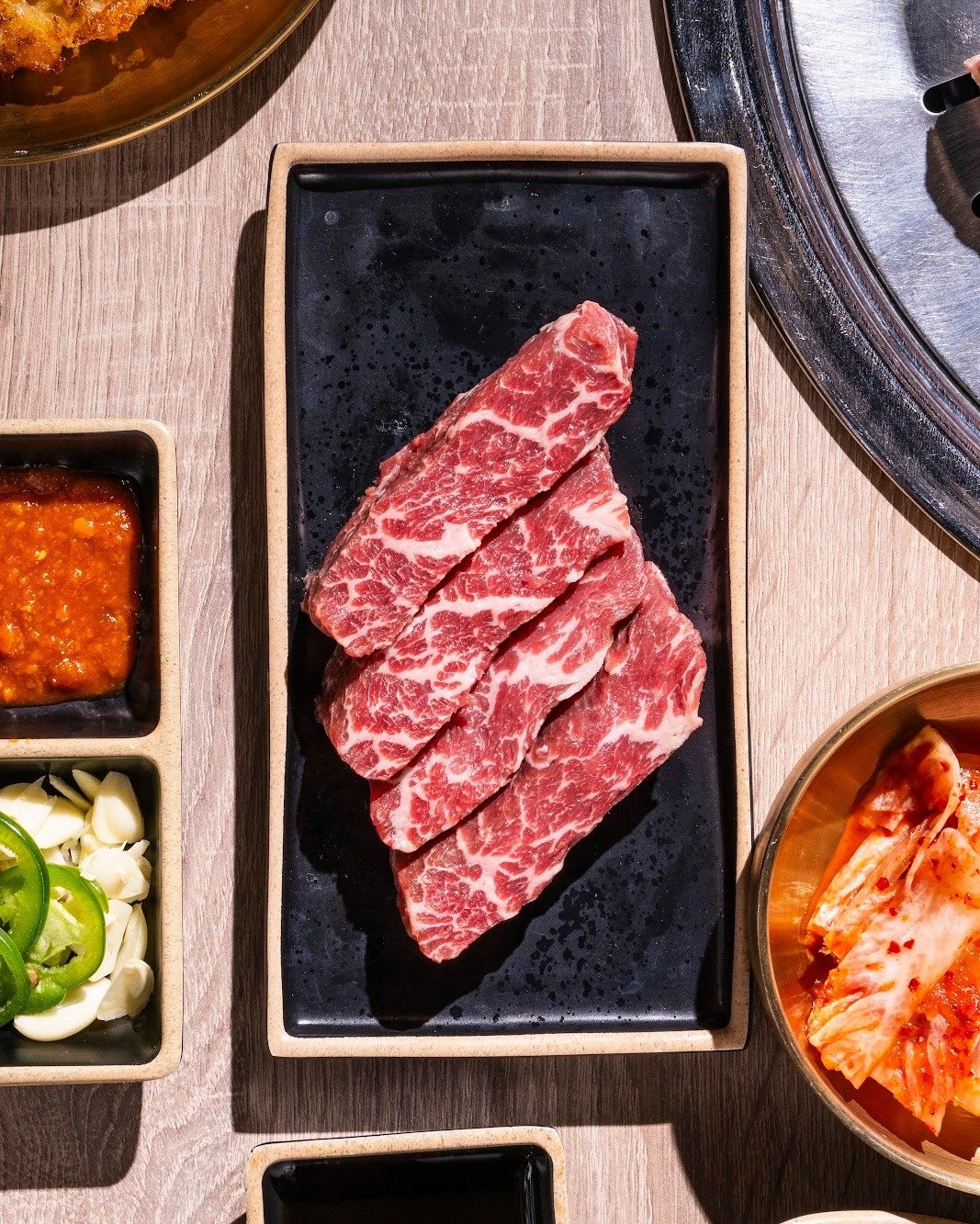 BRB drooling. 🤤 Who else has a favorite cut that they absolutely devour once it leaves the grill? ✋ 

#88qkbbq #meat #meatlover #banchan #asmrgrilling #grillandchill #kbbqislife #koreanbbq