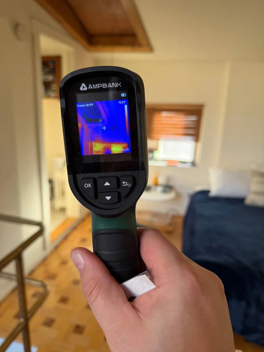 Thermal imaging camera detecting hidden moisture inside Chicago home during mold inspection