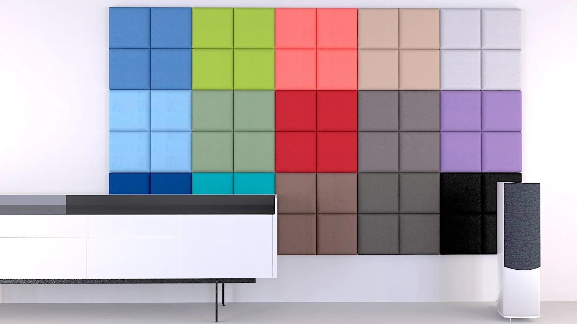Color swatches arranged in a grid pattern on a white wall, with a white cabinet and a speaker in a modern room.