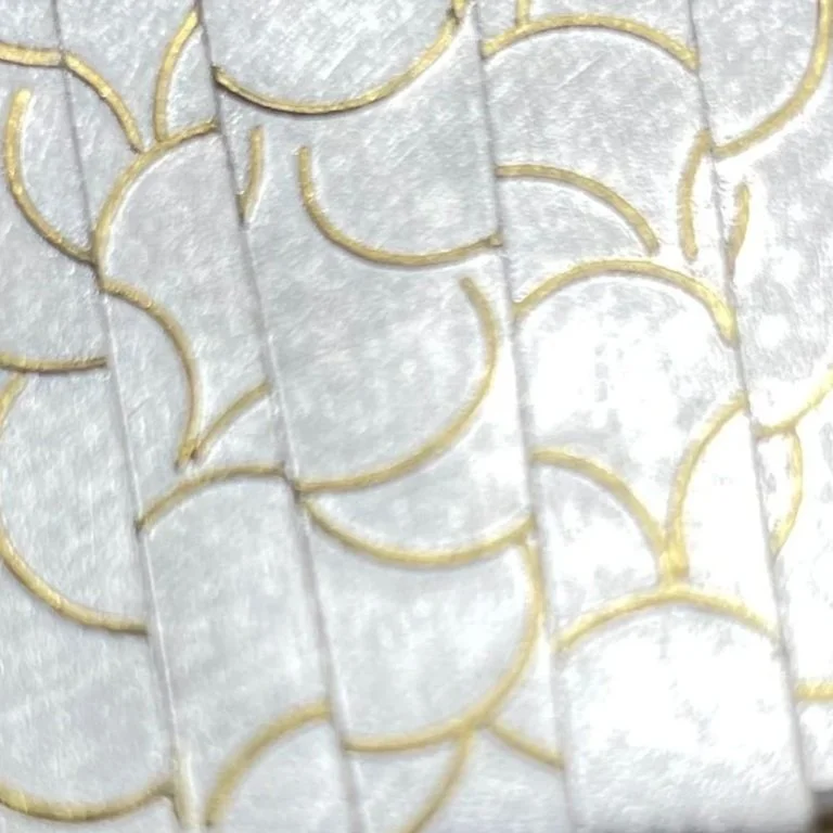 Close up of a 24K gold on Argentium silver patterncreated by fusing.